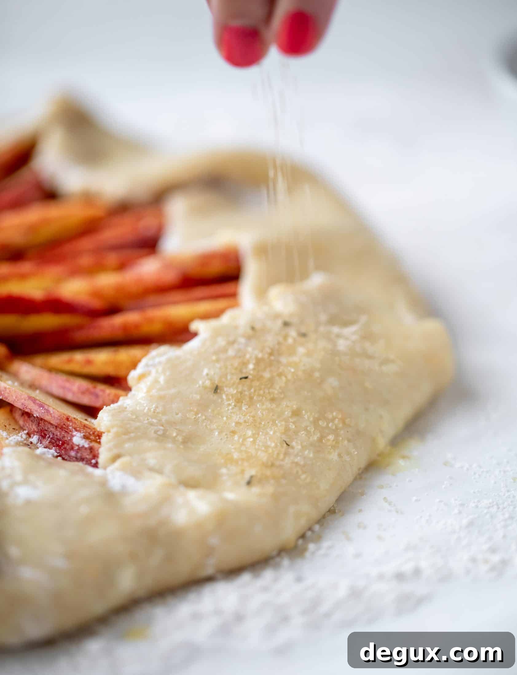 Honeycrisp Apple Galette with Cheddar Crust and Thyme Butter 6 This apple cheddar galette is made with honeycrisp apples, set in a cheddar herb crust and brushed with thyme butter! So delicious and perfect for fall.