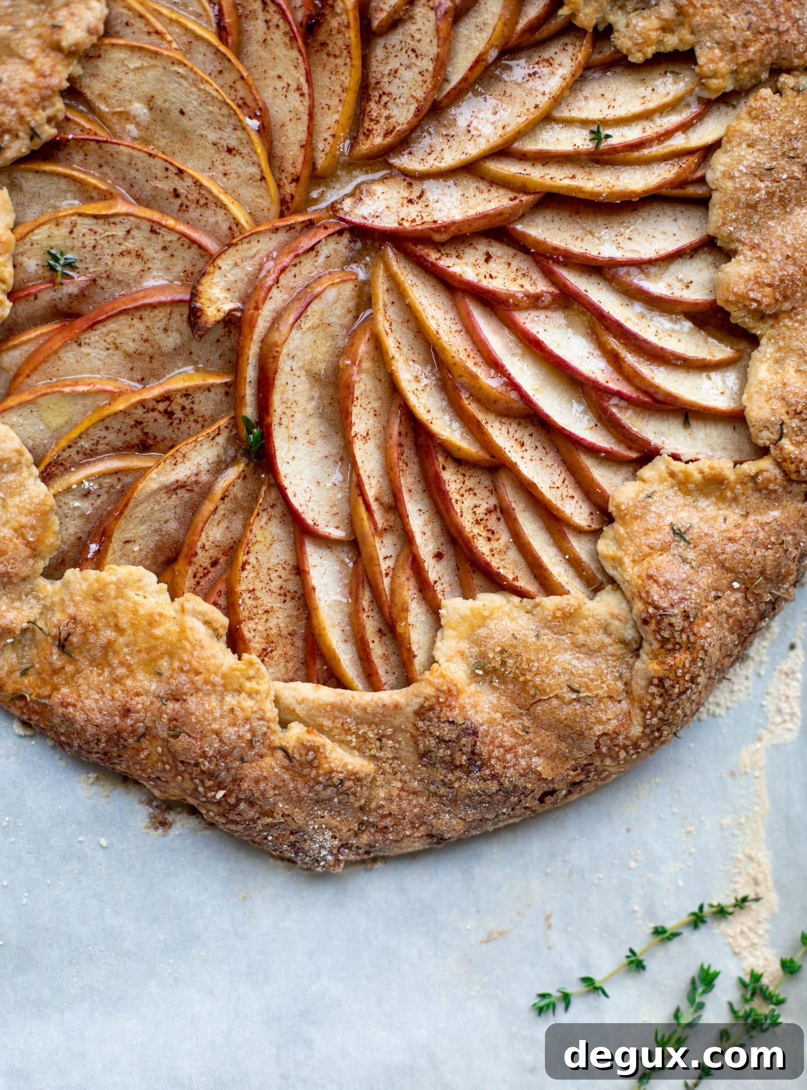 Honeycrisp Apple Galette with Cheddar Crust and Thyme Butter 7 https://www.howsweeteats.com/2015/07/summer-chicken-pot-pie-crostata-with-herbed-crust/