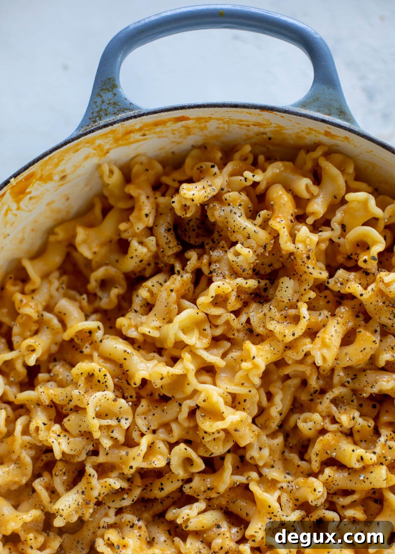 This pumpkin cacio e pepe is just like the classic pasta dish with a hint of fall. Pumpkin, black pepper and parm come together to make the delicious sauce! 