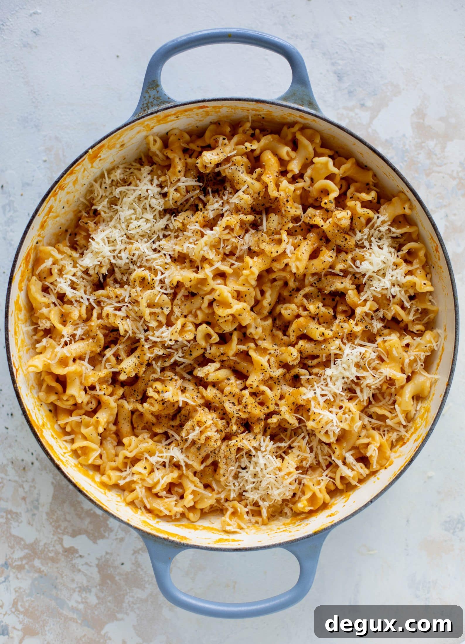 This pumpkin cacio e pepe is just like the classic pasta dish with a hint of fall. Pumpkin, black pepper and parm come together to make the delicious sauce! 