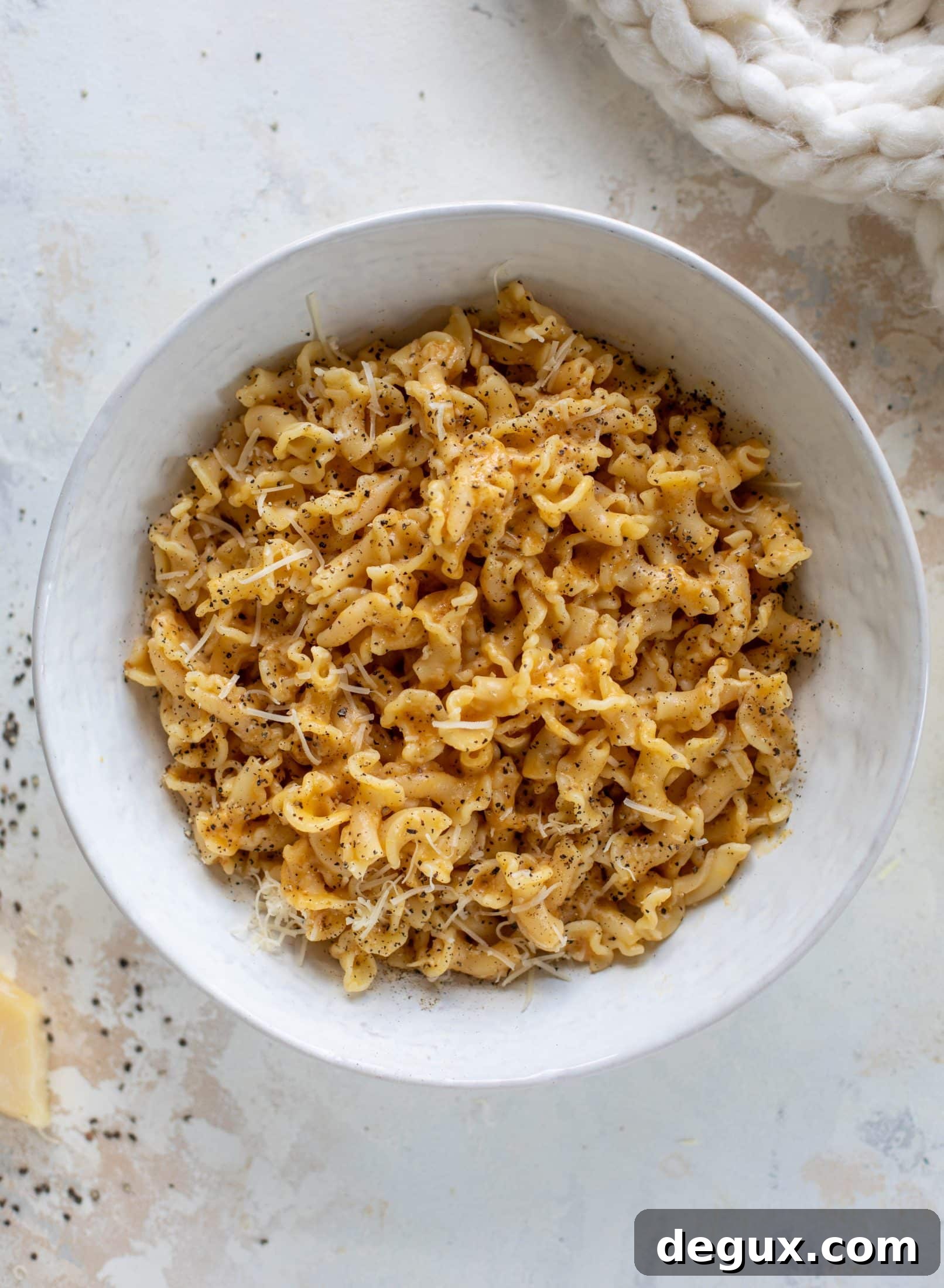 This pumpkin cacio e pepe is just like the classic pasta dish with a hint of fall. Pumpkin, black pepper and parm come together to make the delicious sauce! 