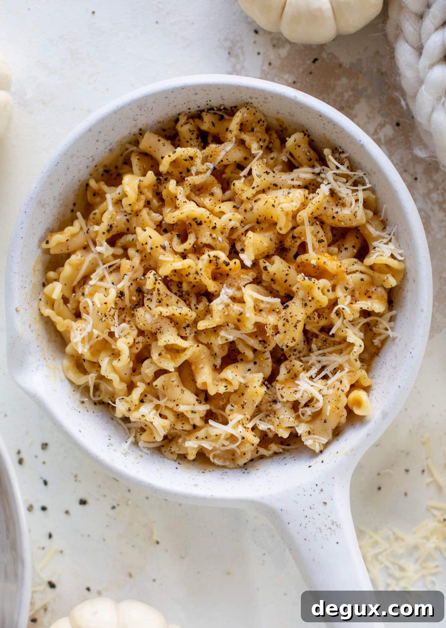 This pumpkin cacio e pepe is just like the classic pasta dish with a hint of fall. Pumpkin, black pepper and parm come together to make the delicious sauce! 