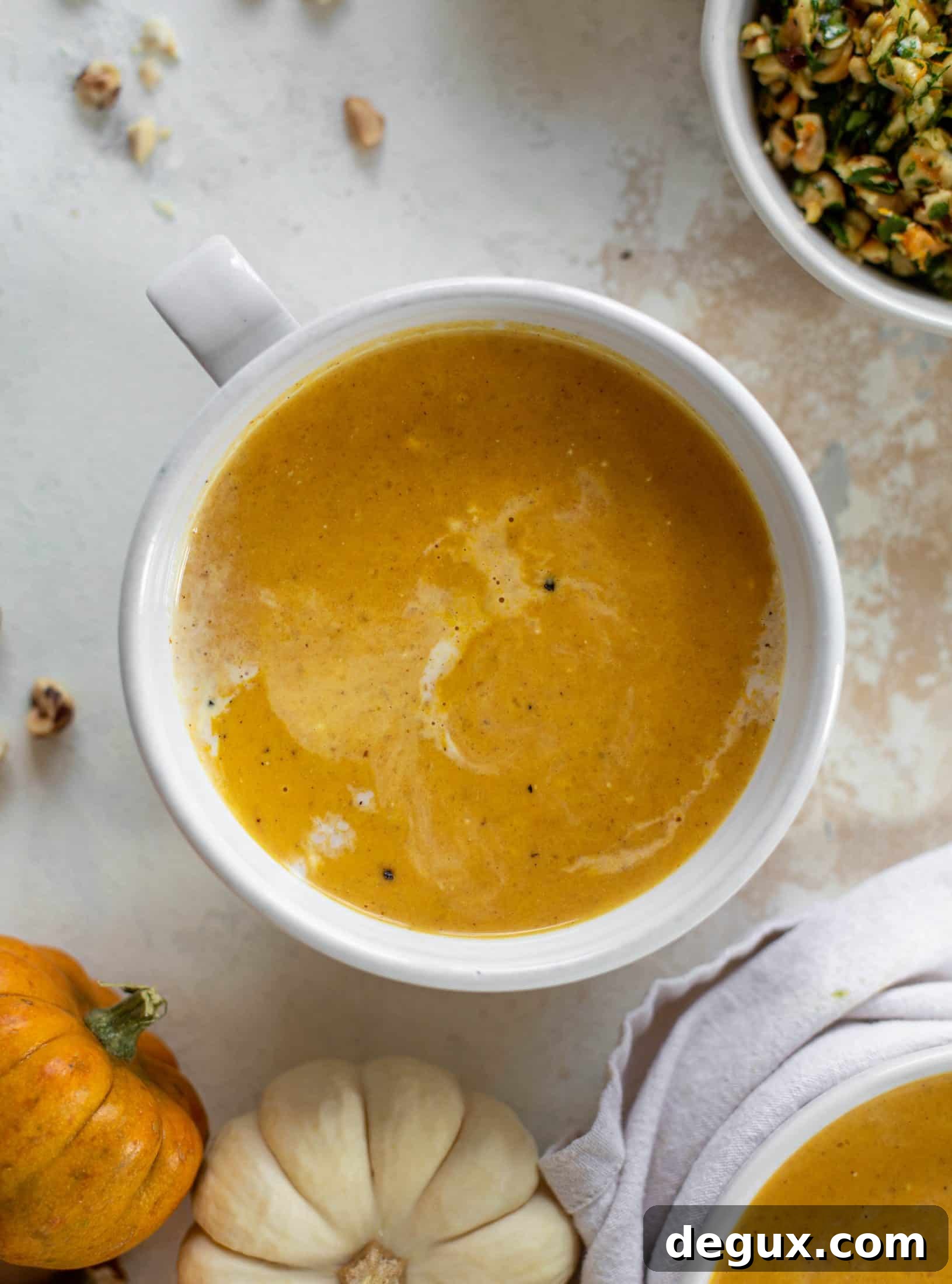 Roasted Pumpkin Soup with Hazelnut Gremolata 4 This pumpkin cream soup is silky smooth and delicious, then topped with a roasted hazelnut gremolata for extra flavor and crunch!