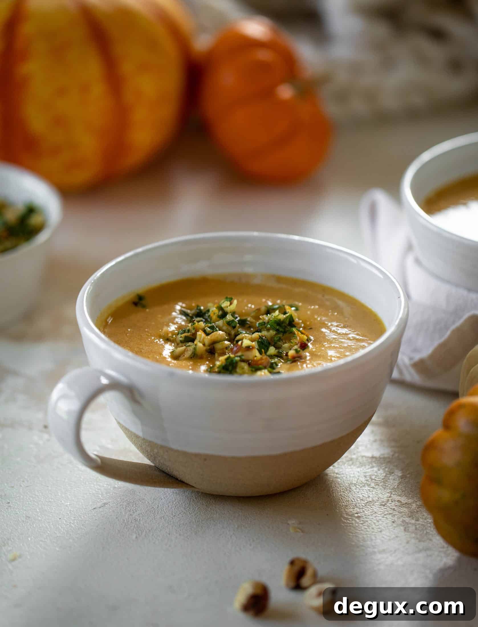 Roasted Pumpkin Soup with Hazelnut Gremolata 5 This pumpkin cream soup is silky smooth and delicious, then topped with a roasted hazelnut gremolata for extra flavor and crunch!