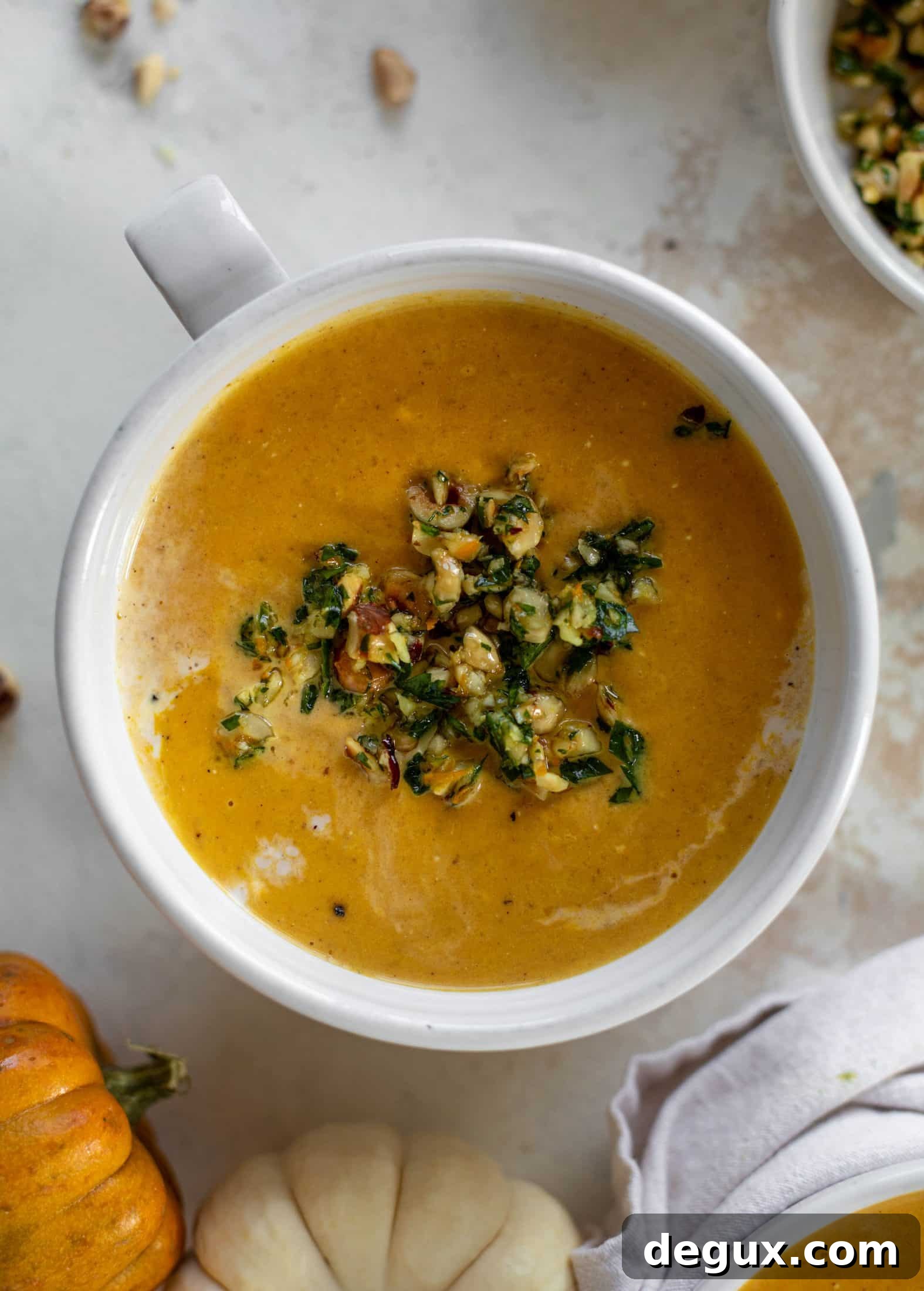 Roasted Pumpkin Soup with Hazelnut Gremolata 9 This pumpkin cream soup is silky smooth and delicious, then topped with a roasted hazelnut gremolata for extra flavor and crunch!