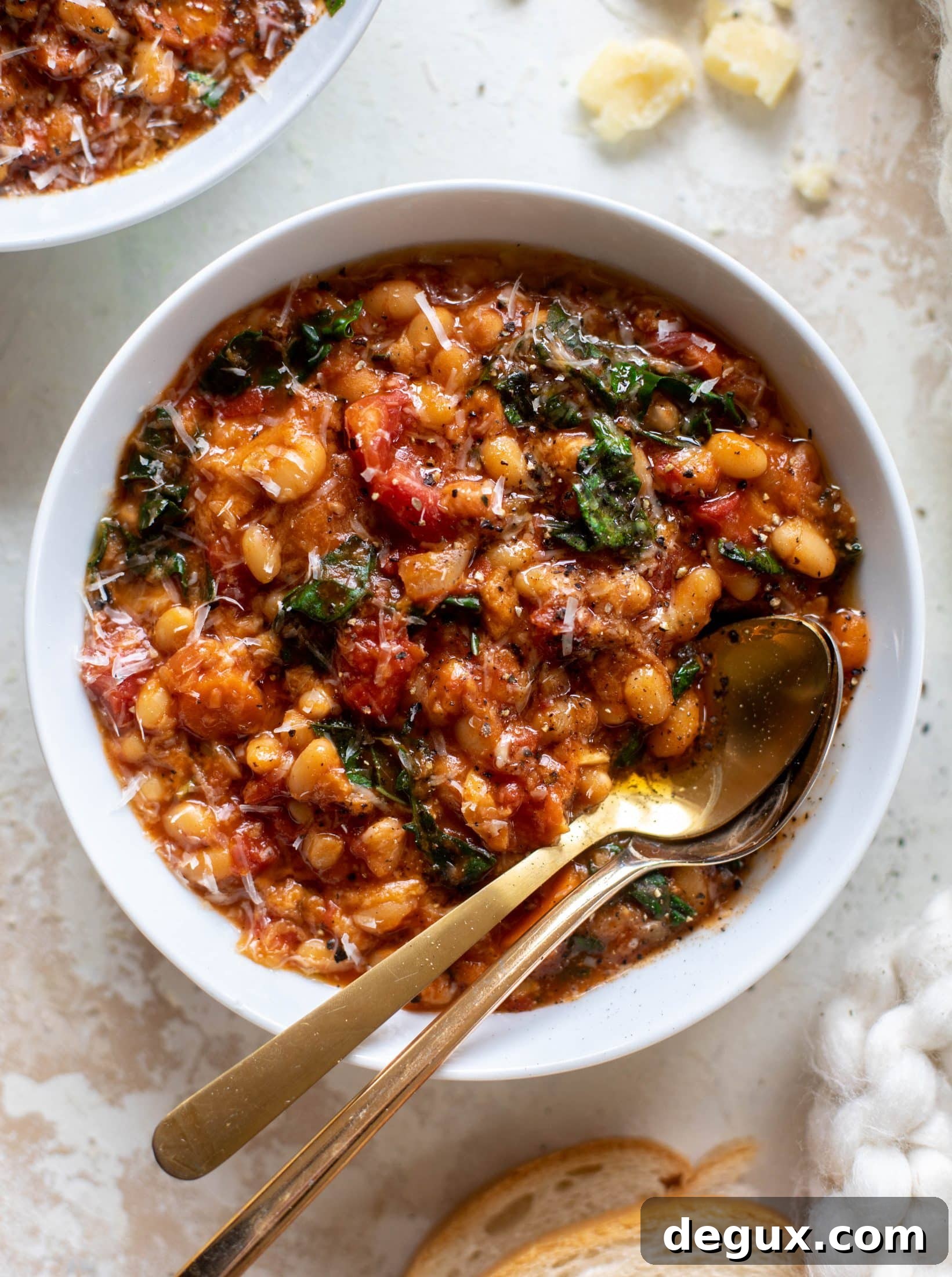 This tuscan tomato bread soup is super hearty, satisfying and delicious! Leftovers are a hit and you will find yourself craving this in the cooler months.