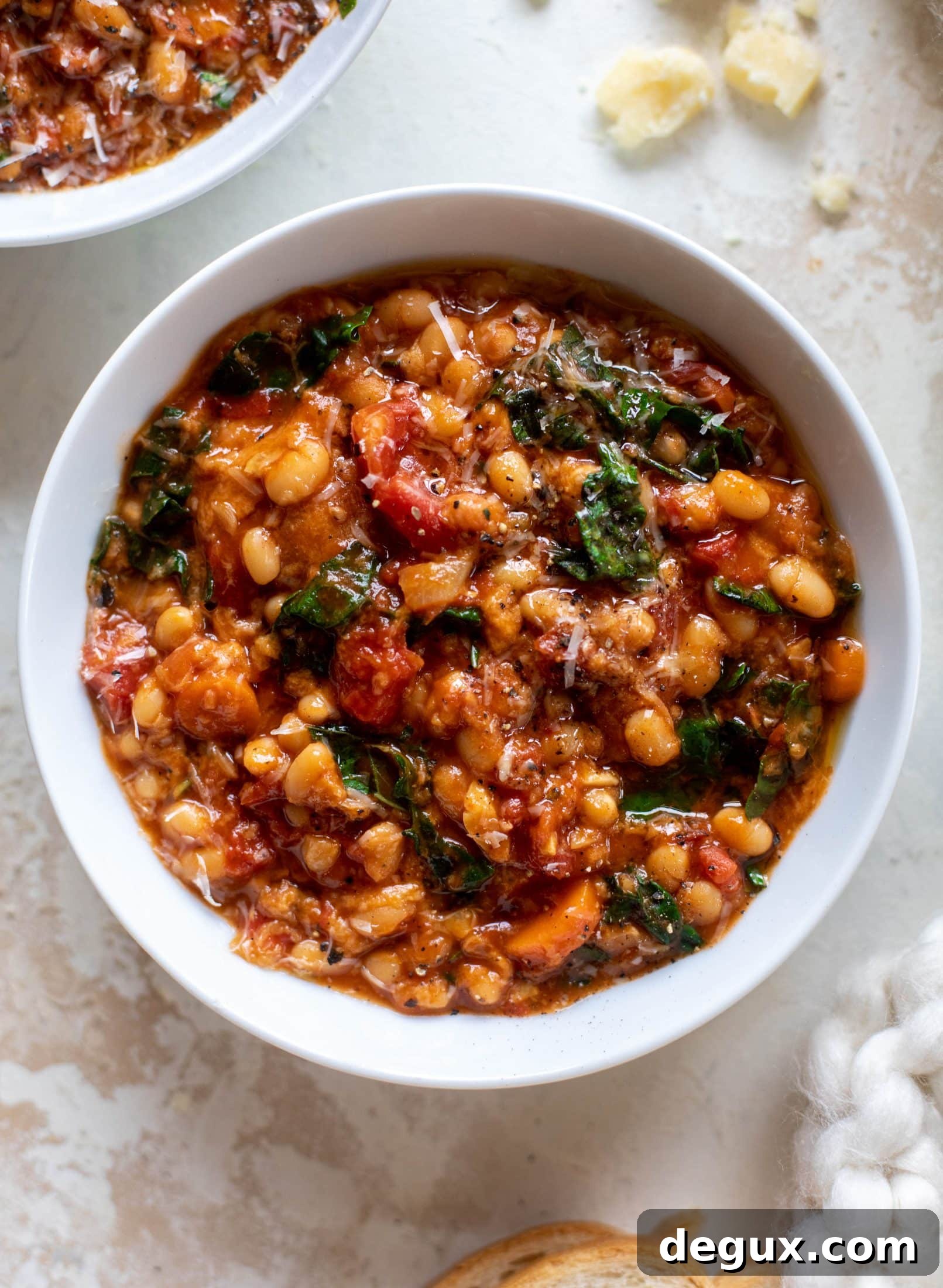 Tuscan Tomato, White Bean & Kale Soup Recipe 5 This tuscan tomato bread soup is super hearty, satisfying and delicious! Leftovers are a hit and you will find yourself craving this in the cooler months.