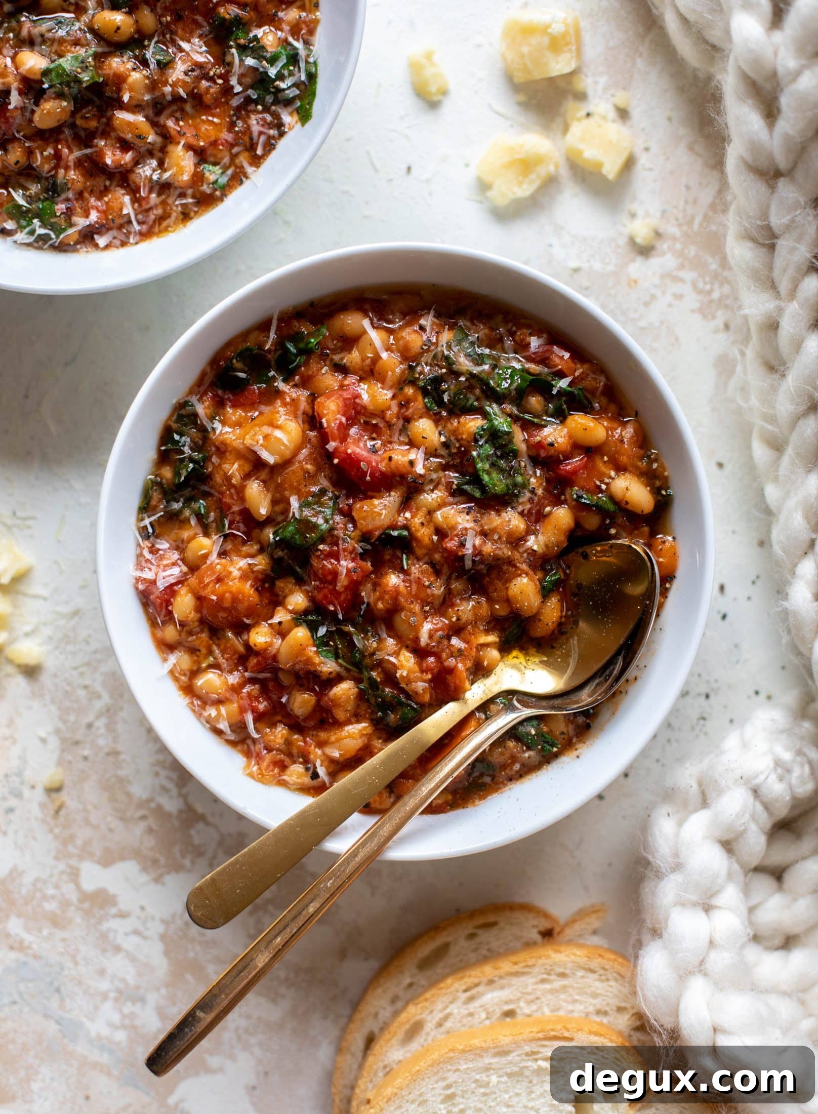 Tuscan Tomato, White Bean & Kale Soup Recipe 6 This tuscan tomato bread soup is super hearty, satisfying and delicious! Leftovers are a hit and you will find yourself craving this in the cooler months.