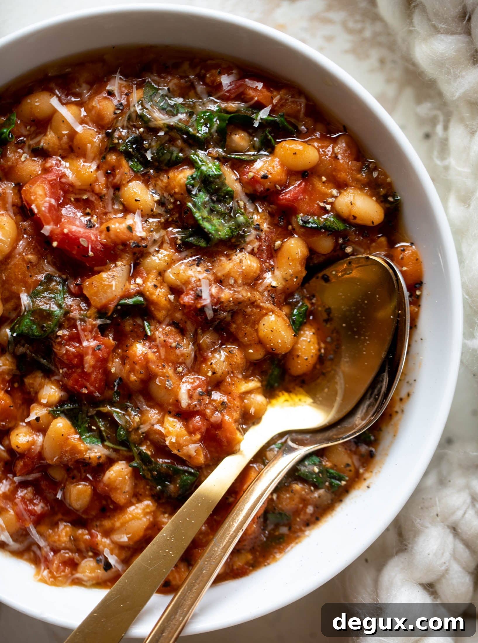 Tuscan Tomato, White Bean & Kale Soup Recipe 9 This tuscan tomato bread soup is super hearty, satisfying and delicious! Leftovers are a hit and you will find yourself craving this in the cooler months.