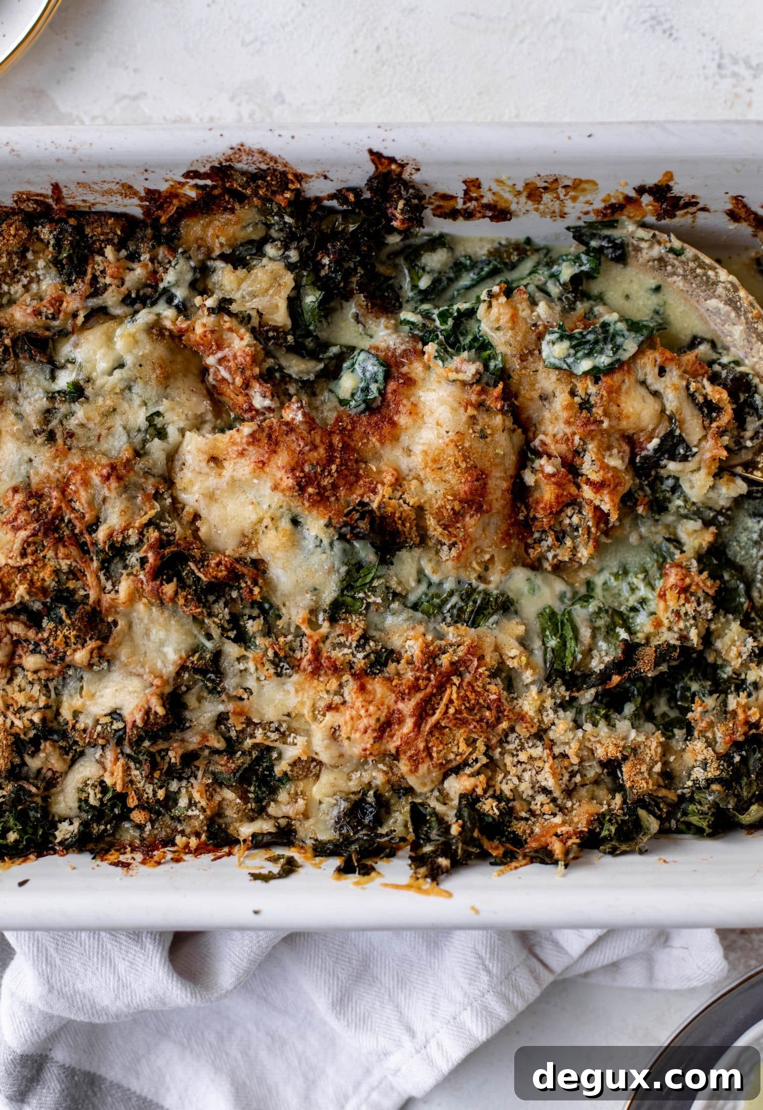 This double kale gratin has two kinds of kale, three kinds of cheese, cream and crunchy breadcrumbs. It will be your new favorite side dish!