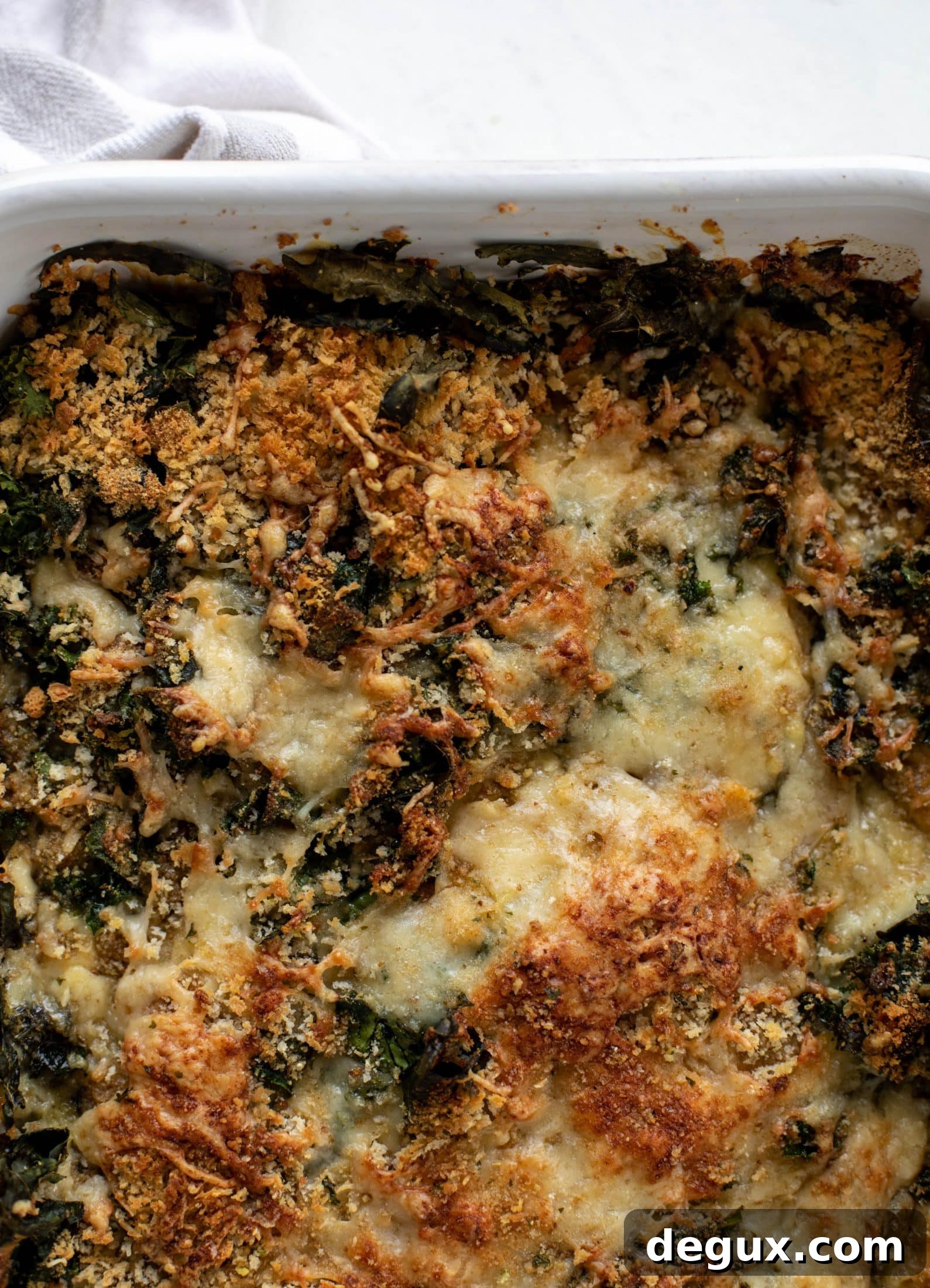 This double kale gratin has two kinds of kale, three kinds of cheese, cream and crunchy breadcrumbs. It will be your new favorite side dish!