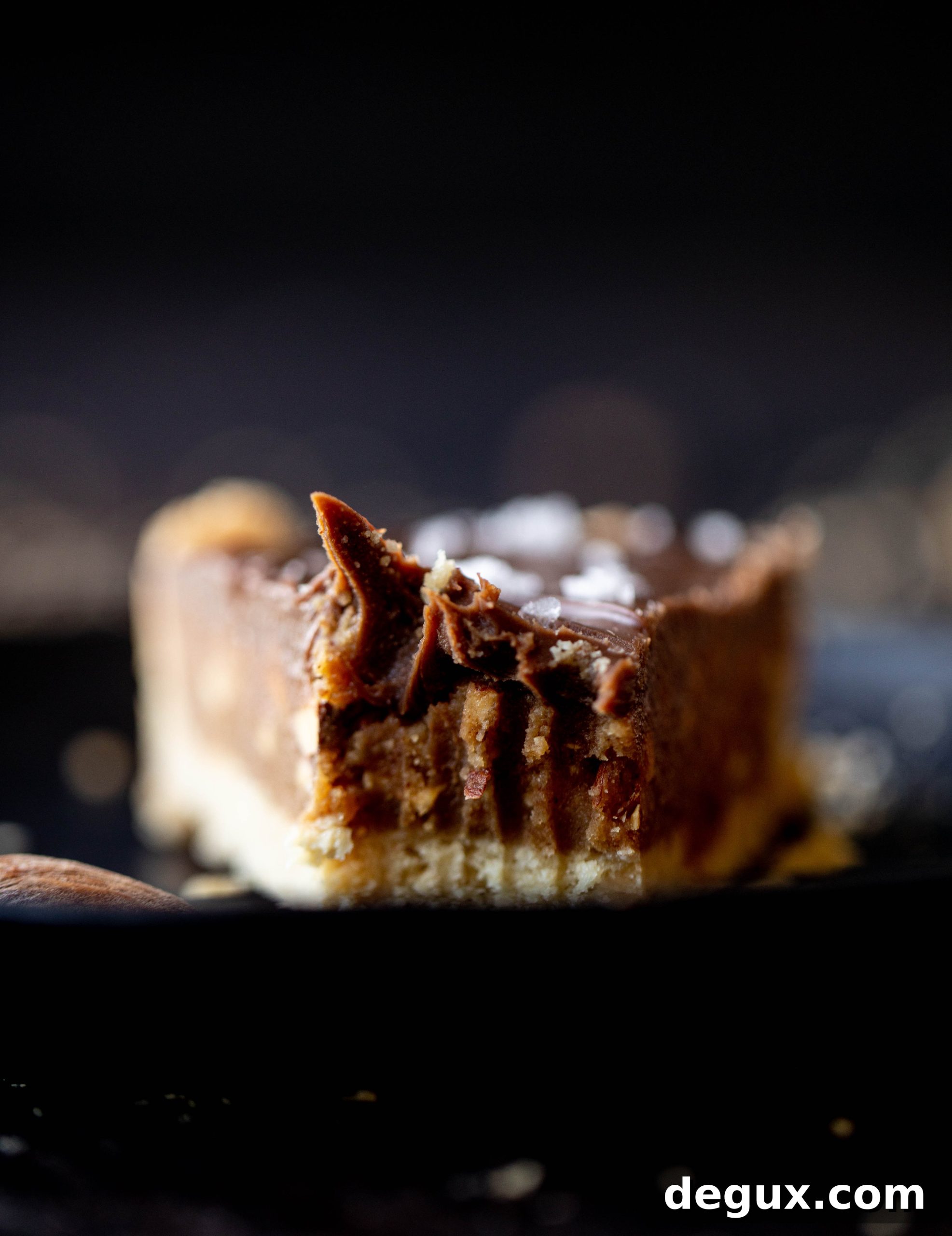 Salted Almond Butter Snickers Tart Recipe 9 This snickers almond tart is made with an almond crust, homemade almond butter caramel and a chocolate ganache. It's to die for!