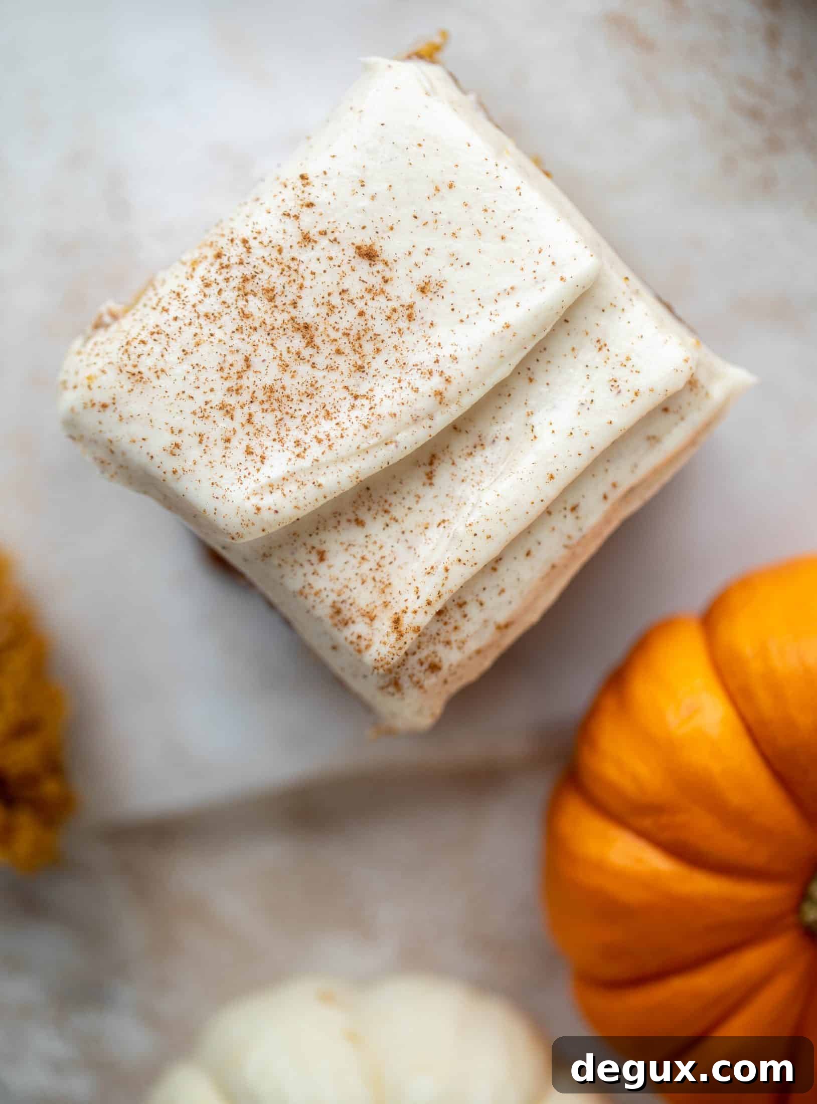 This pumpkin sheet cake is a legit pumpkin dream cake! It's so moist and fluffy and flavorful. With a blanket of cinnamon cream cheese frosting!