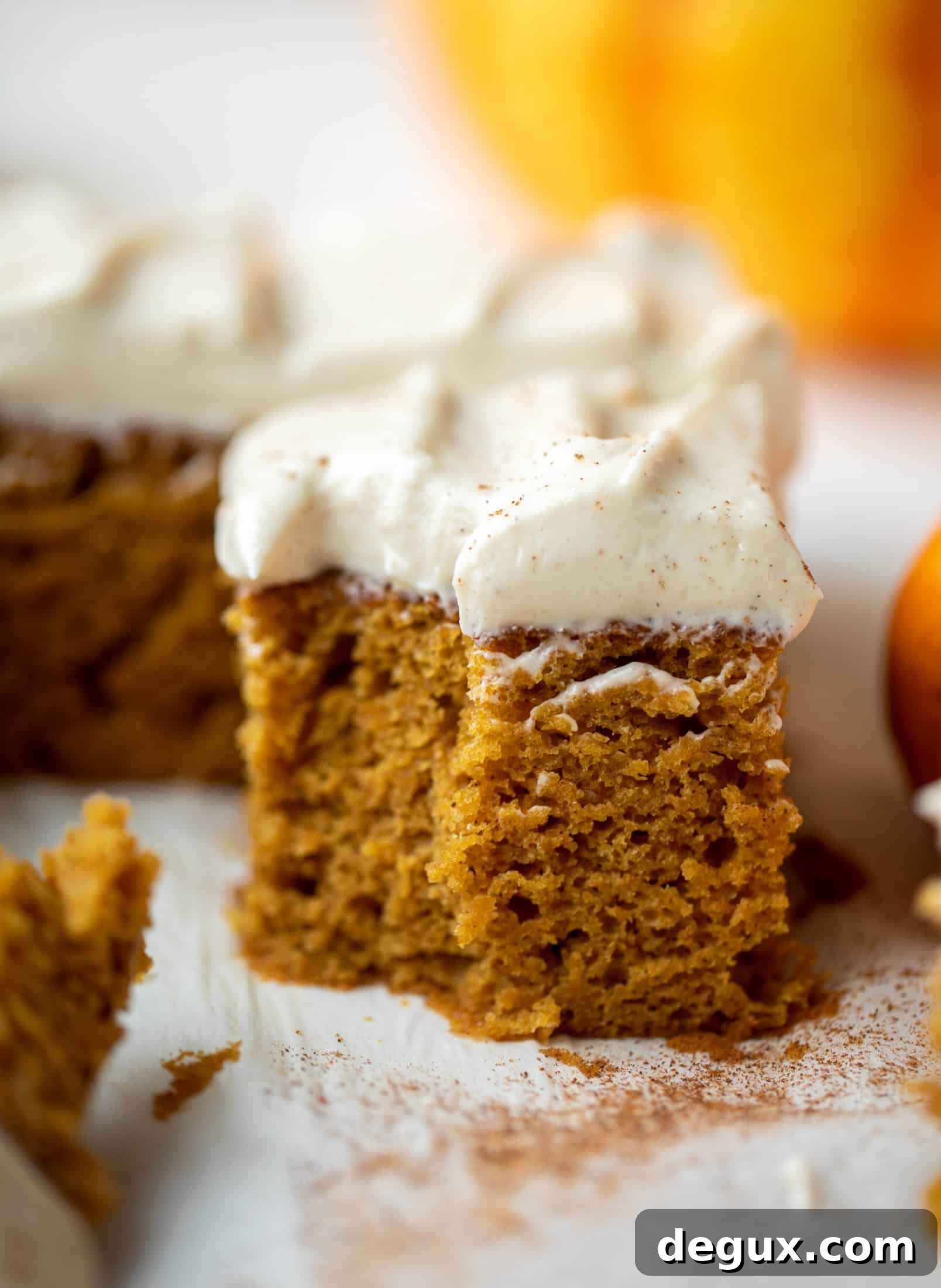 This pumpkin sheet cake is a legit pumpkin dream cake! It's so moist and fluffy and flavorful. With a blanket of cinnamon cream cheese frosting!