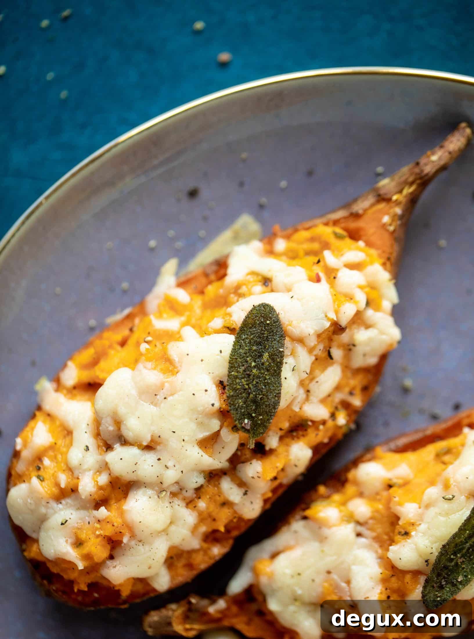 Twice-Baked Sweet Potatoes with Pumpkin, Sage & Brown Butter 11 These twice baked sweet potatoes are whipped with crispy sage and pumpkin puree! Topped with cheese and baked until melty, they are super delish.