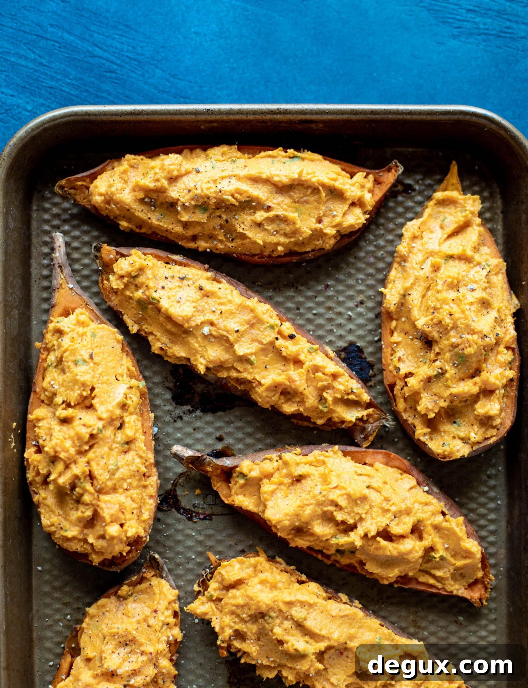 Twice-Baked Sweet Potatoes with Pumpkin, Sage & Brown Butter 5 These twice baked sweet potatoes are whipped with crispy sage and pumpkin puree! Topped with cheese and baked until melty, they are super delish.