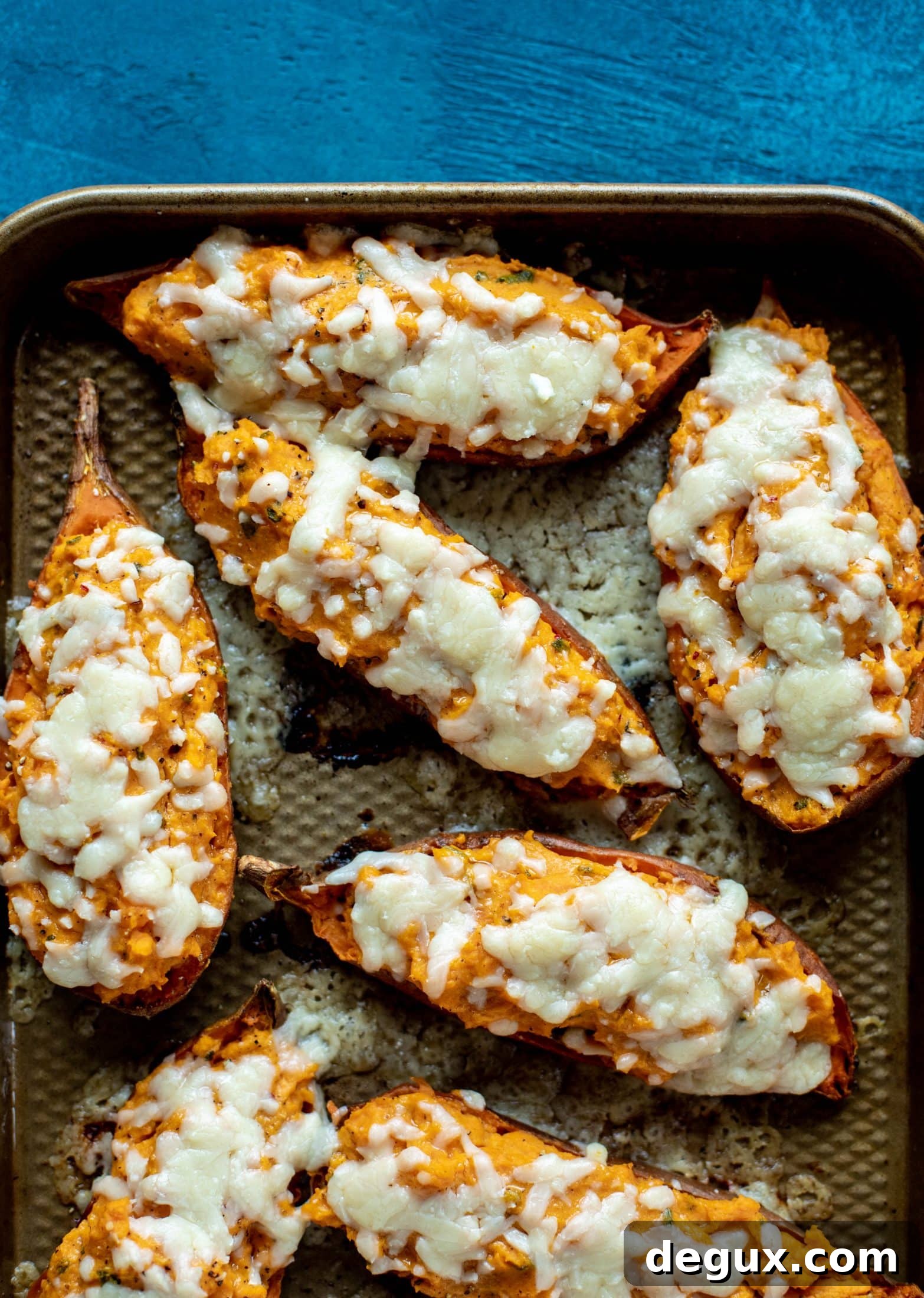 Twice-Baked Sweet Potatoes with Pumpkin, Sage & Brown Butter 8 These twice baked sweet potatoes are whipped with crispy sage and pumpkin puree! Topped with cheese and baked until melty, they are super delish.