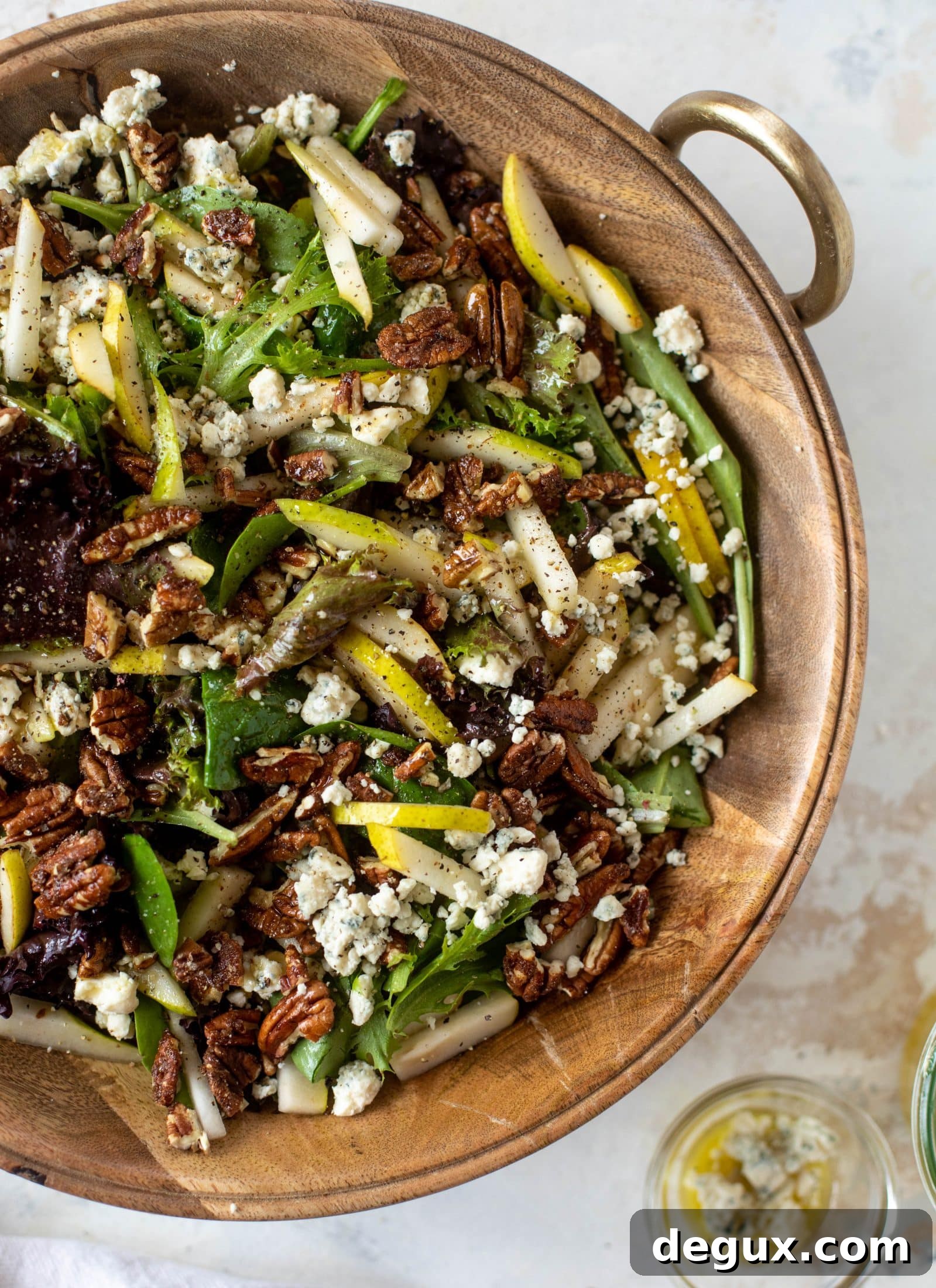 Holiday Pear, Gorgonzola & Sweet-Spiced Pecan Salad Recipe 6 This pear gorgonzola is the perfect simple greens salad for the holiday and winter season! Topped with sweet and spicy pecans and champagne vinaigrette!