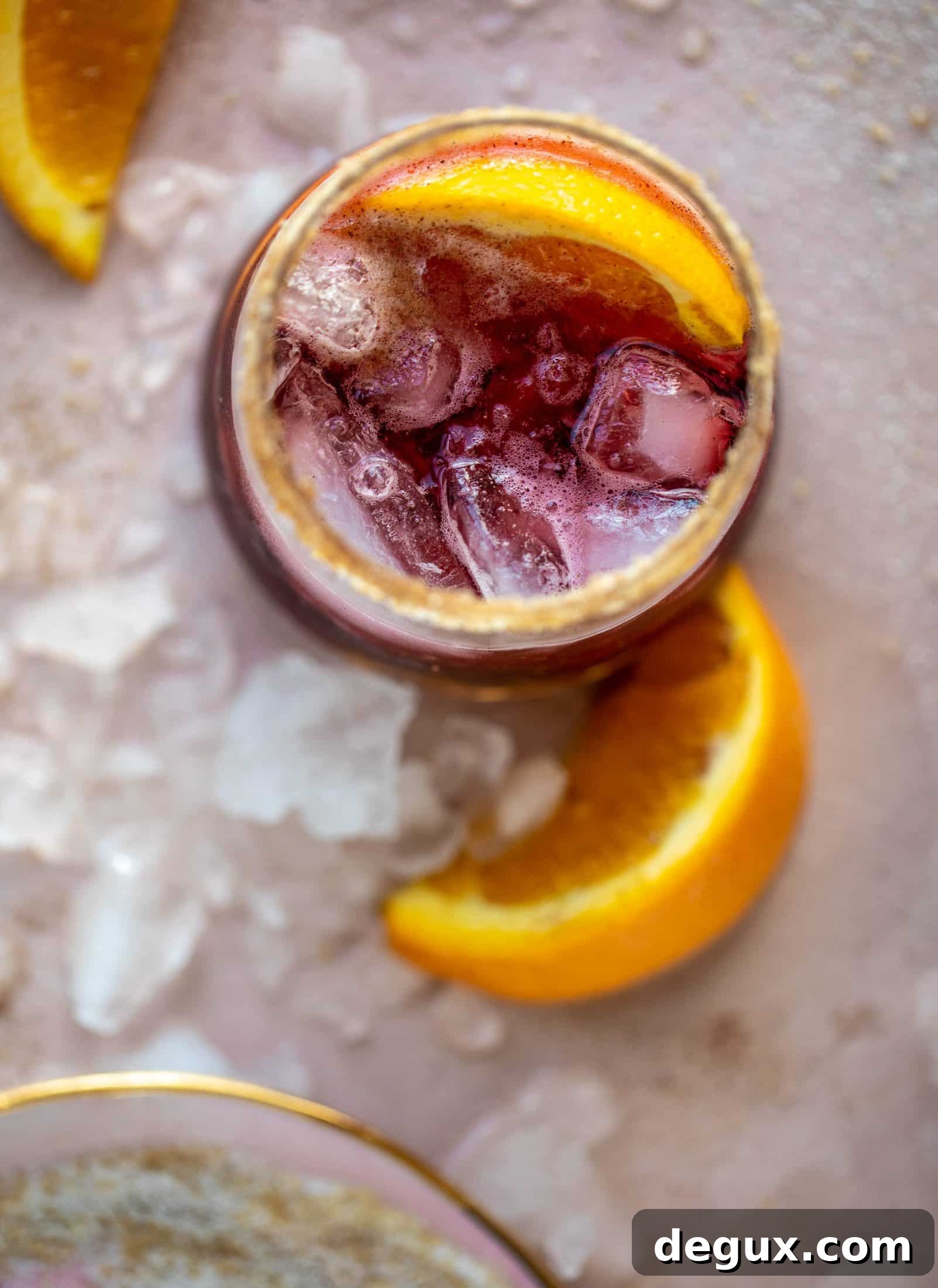 A refreshing and warming lambrusco smash, made with bubbly red wine, bourbon, orange soda and maple syrup. Tastes like the holidays!