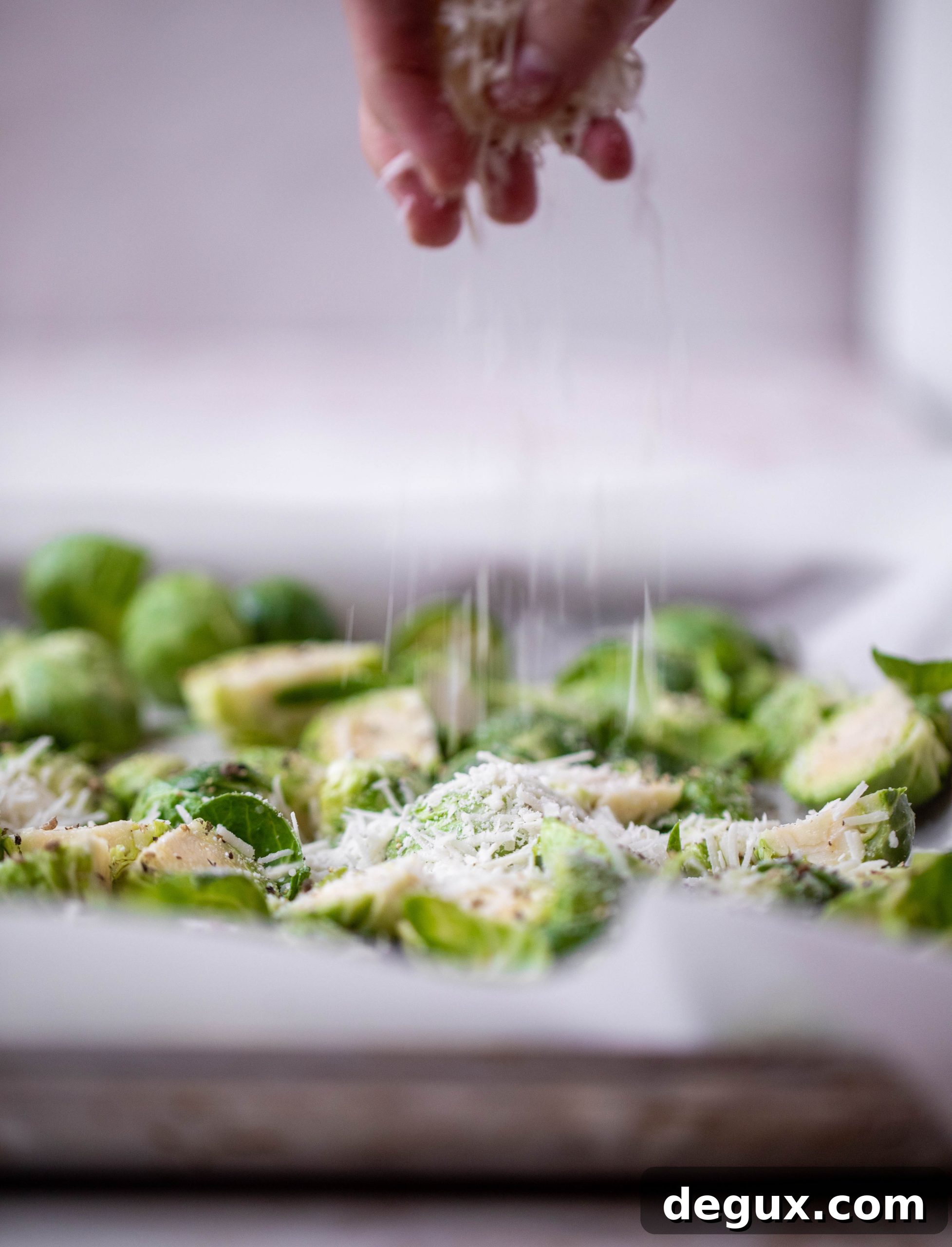 This cacio e pepe brussels are out of the world. Roasted until crisp, topped with tons of black pepper and salty pecorino cheese. Yum.