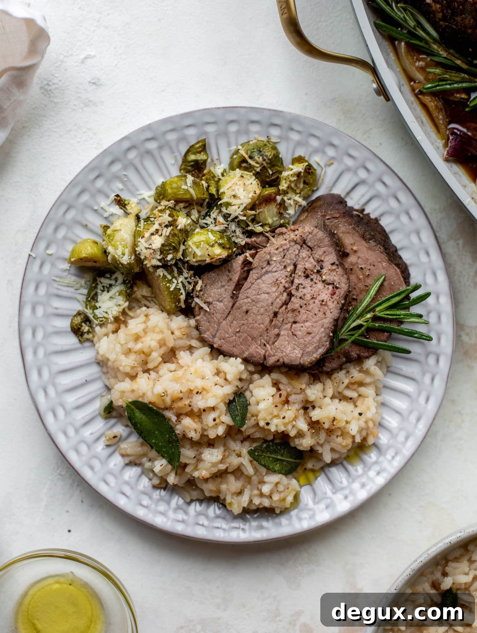 The ultimate special occasion meal! Espresso crusted filet paired with truffle sage risotto and cacio e pepe brussels. So much flavor - it's perfect for the holidays!
