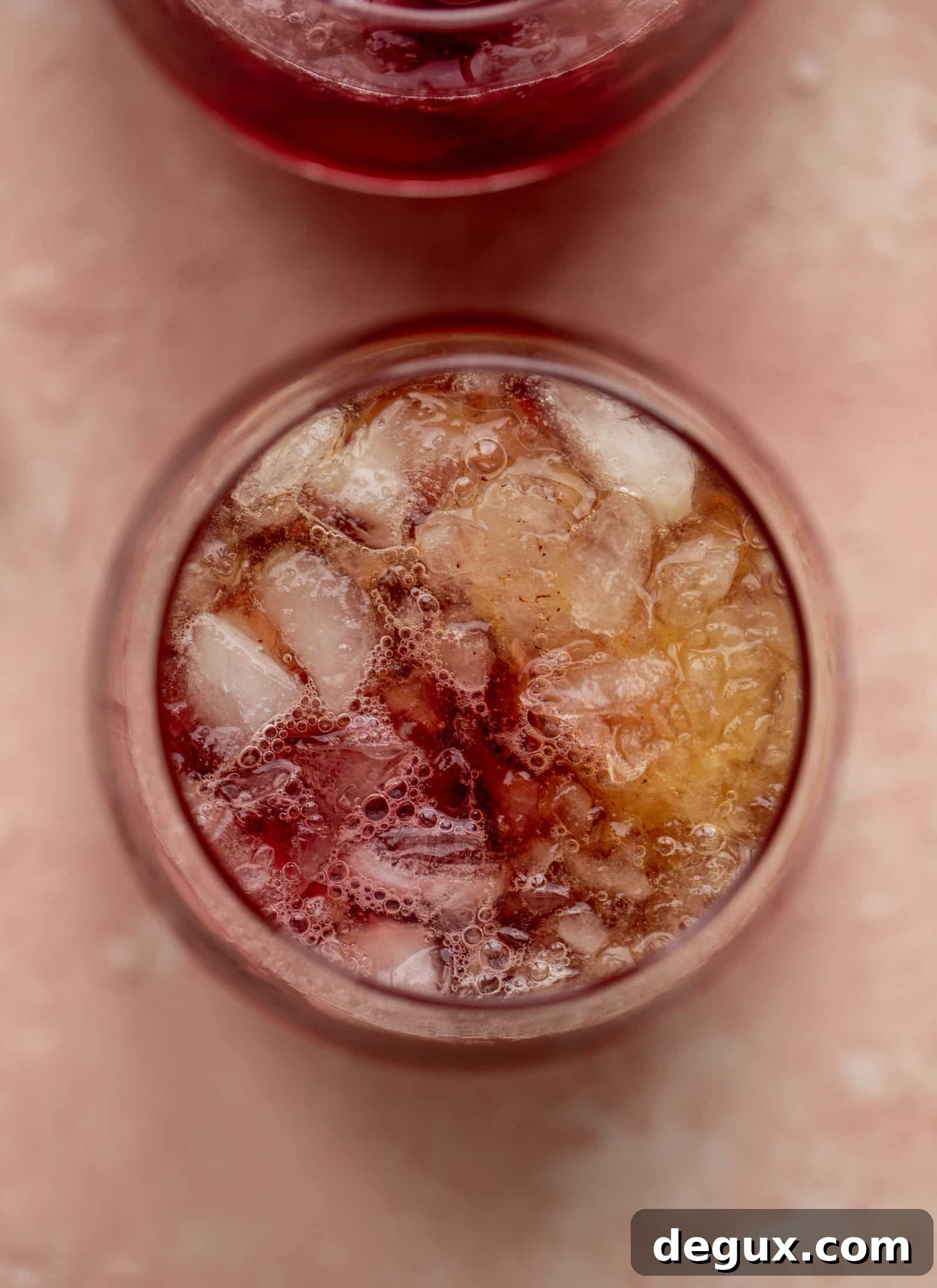 Cranberry Cobbler Smash Cocktail Recipe 4 This cranberry cobbler smash is perfect for the holiday season! Bourbon, cinnamon simple syrup and cranberry juice - it's spiced and warming and wonderful.