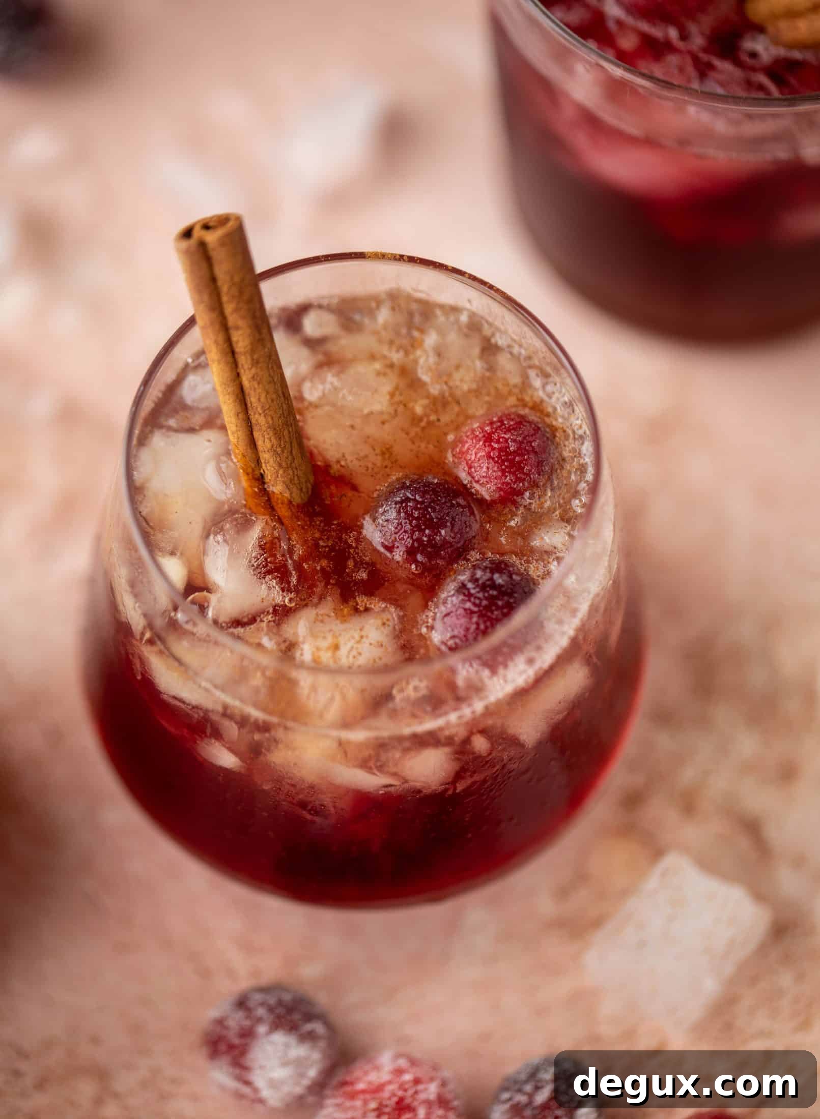 Cranberry Cobbler Smash Cocktail Recipe 5 This cranberry cobbler smash is perfect for the holiday season! Bourbon, cinnamon simple syrup and cranberry juice - it's spiced and warming and wonderful.