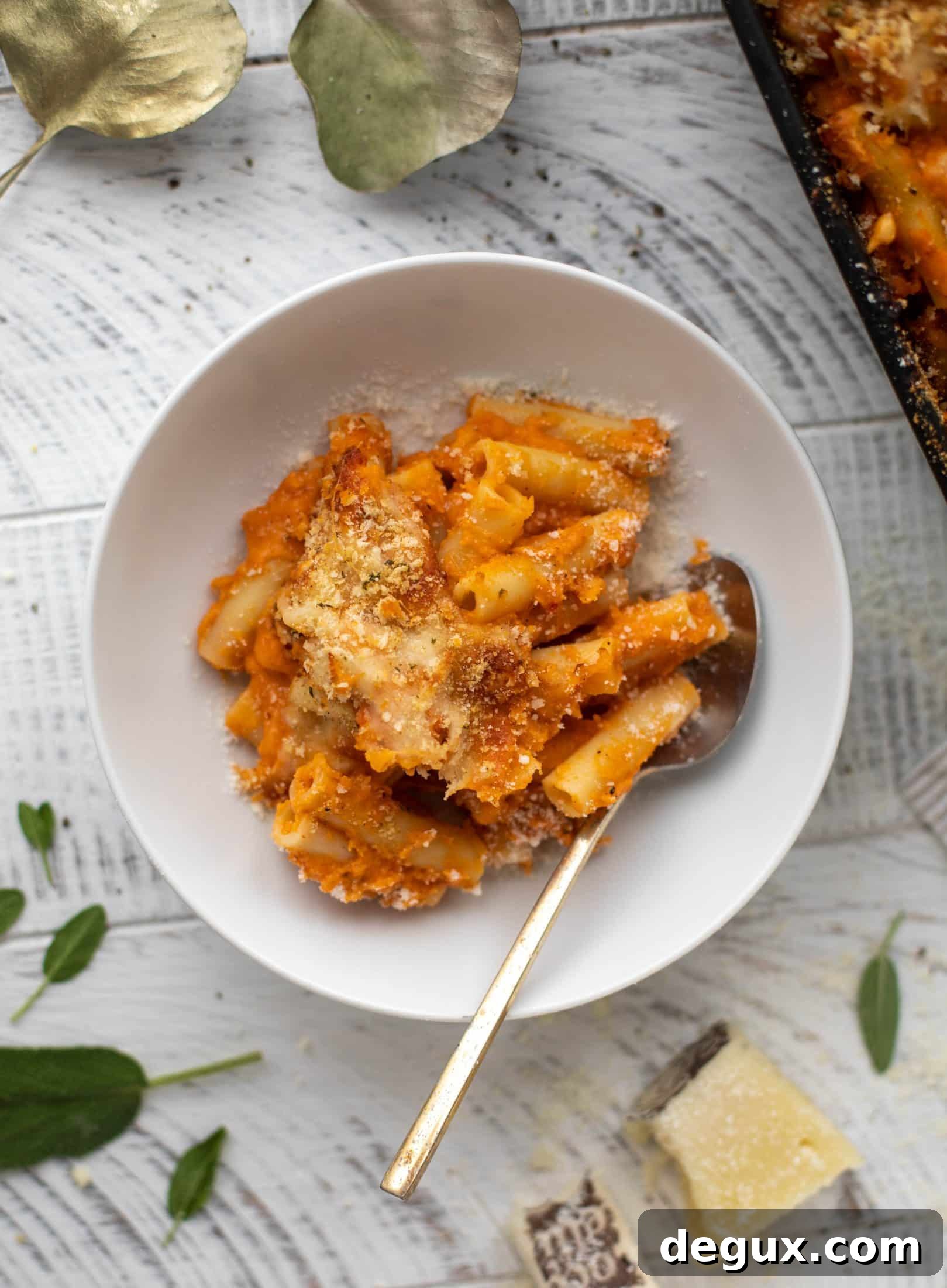 Butternut squash baked ziti is the ultimate comfort food! Squash, fire roasted tomatoes, parmesan and mozzarella make the best sauce ever.
