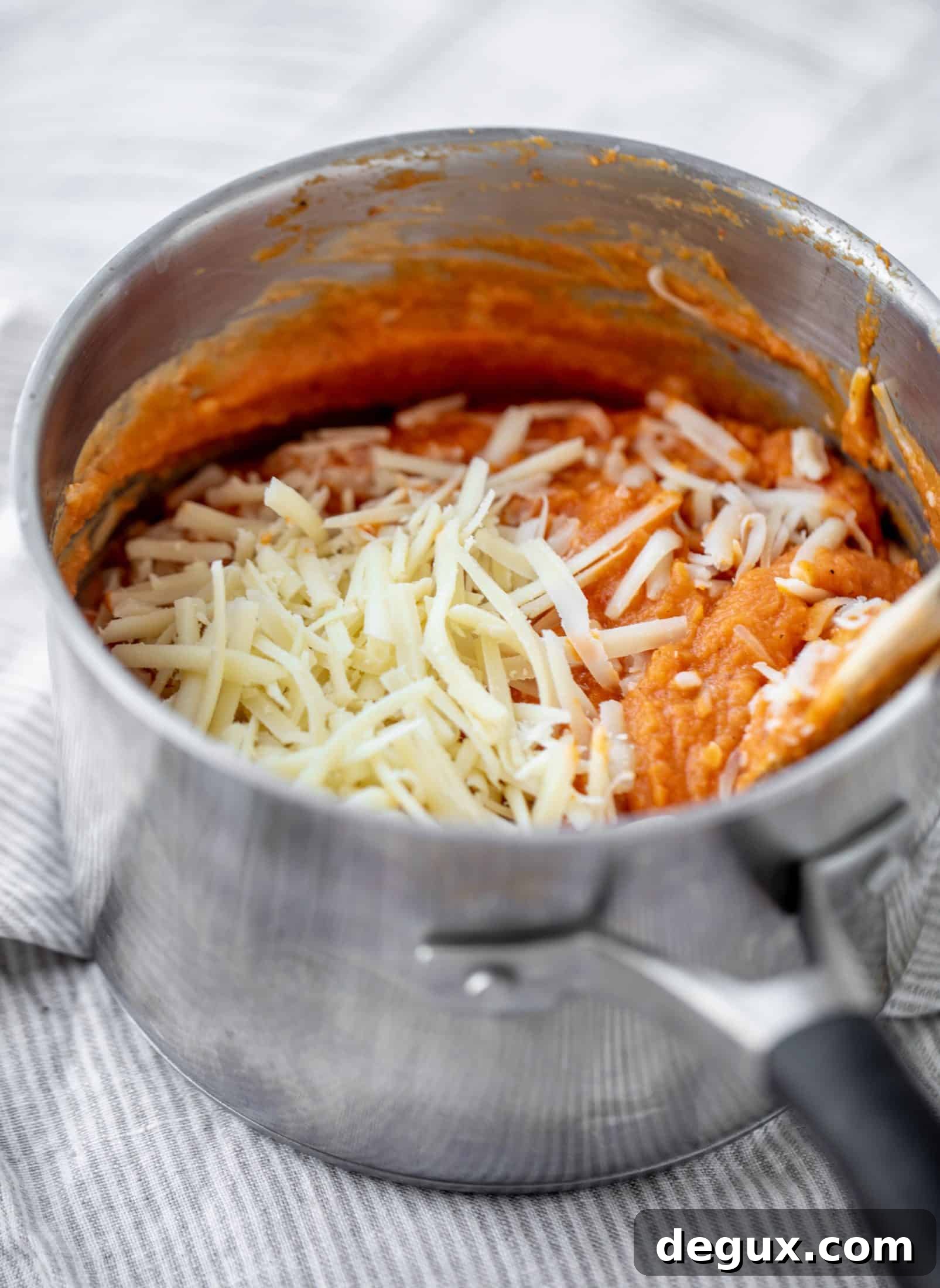 Butternut squash baked ziti is the ultimate comfort food! Squash, fire roasted tomatoes, parmesan and mozzarella make the best sauce ever.
