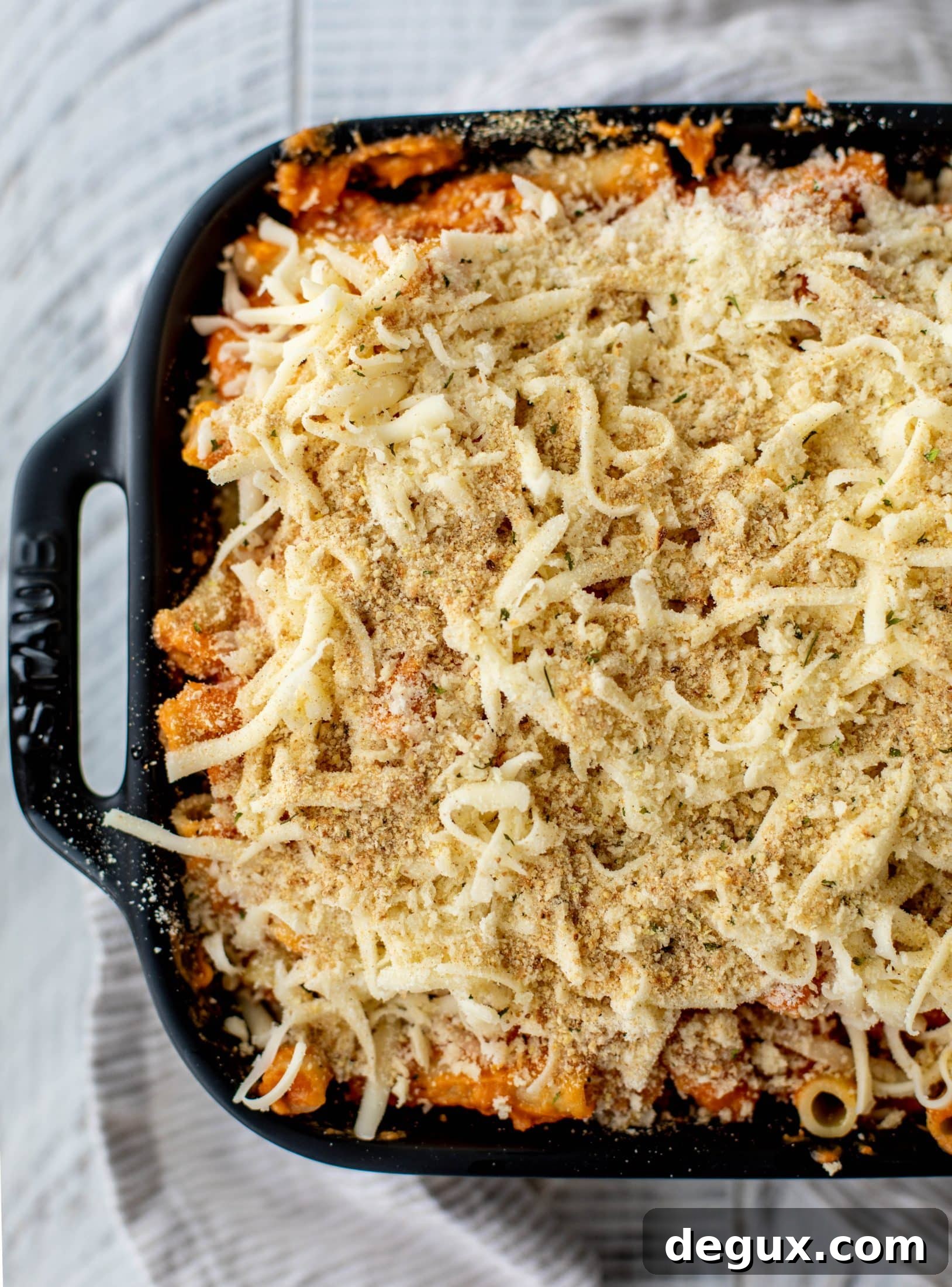 Butternut squash baked ziti is the ultimate comfort food! Squash, fire roasted tomatoes, parmesan and mozzarella make the best sauce ever.