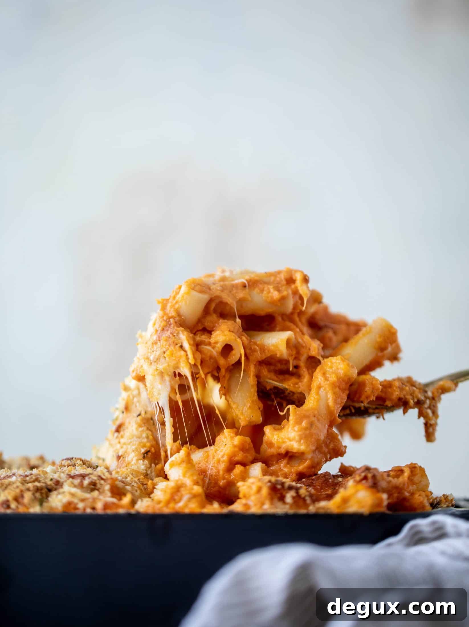 Butternut squash baked ziti is the ultimate comfort food! Squash, fire roasted tomatoes, parmesan and mozzarella make the best sauce ever.