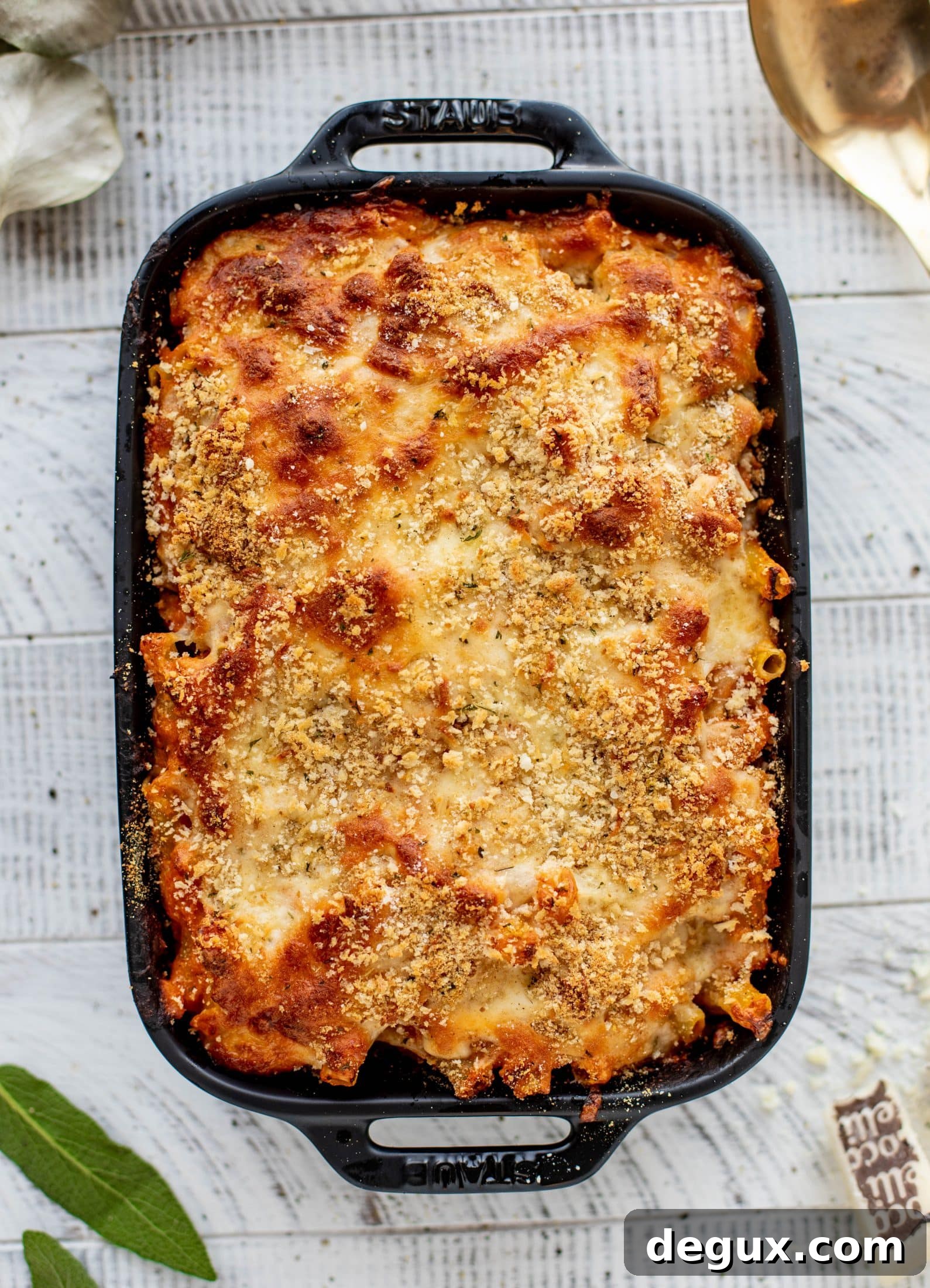 Butternut squash baked ziti is the ultimate comfort food! Squash, fire roasted tomatoes, parmesan and mozzarella make the best sauce ever.