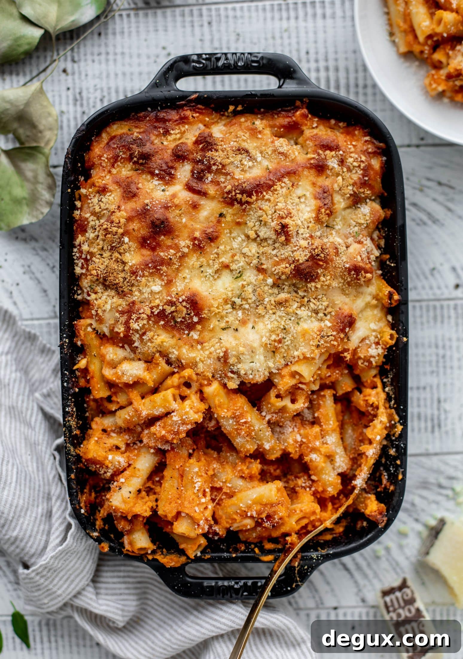 Butternut squash baked ziti is the ultimate comfort food! Squash, fire roasted tomatoes, parmesan and mozzarella make the best sauce ever.