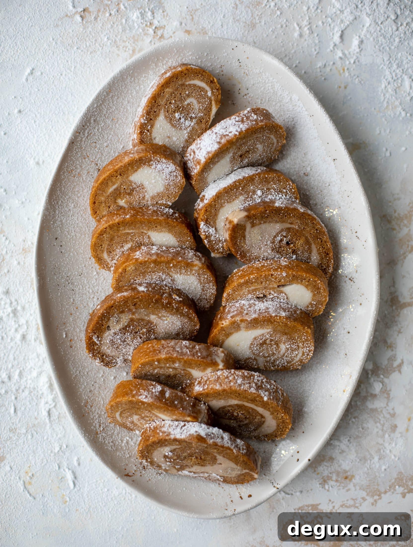 Frozen Pumpkin Rolls: Two Delicious Make-Ahead Recipes 2 This frozen pumpkin roll is a delicious twist on the classic! Ice cream or non-dairy dessert is spread inside a classic pumpkin roll and serve frozen!