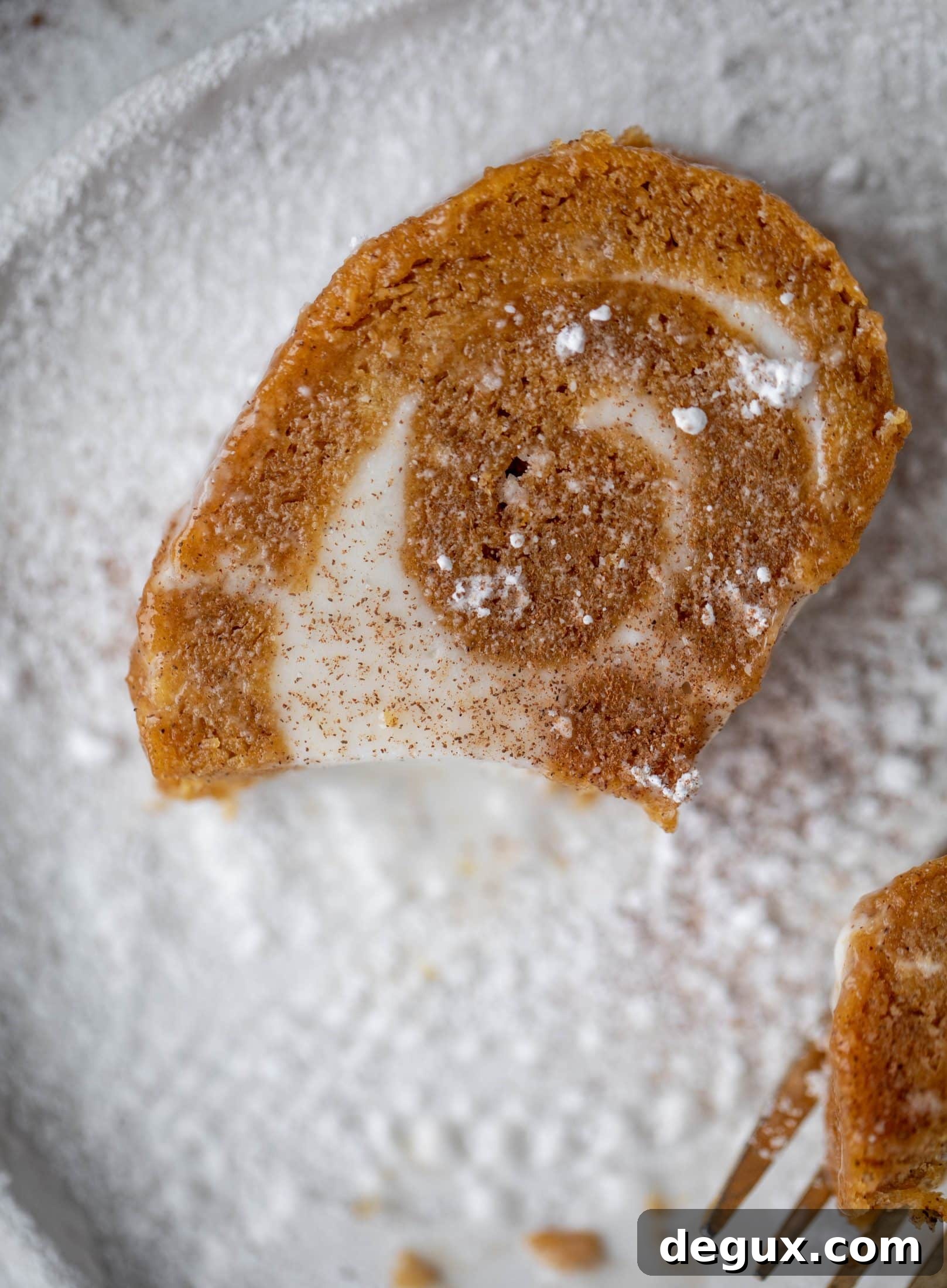 Frozen Pumpkin Rolls: Two Delicious Make-Ahead Recipes 11 This frozen pumpkin roll is a delicious twist on the classic! Ice cream or non-dairy dessert is spread inside a classic pumpkin roll and serve frozen!