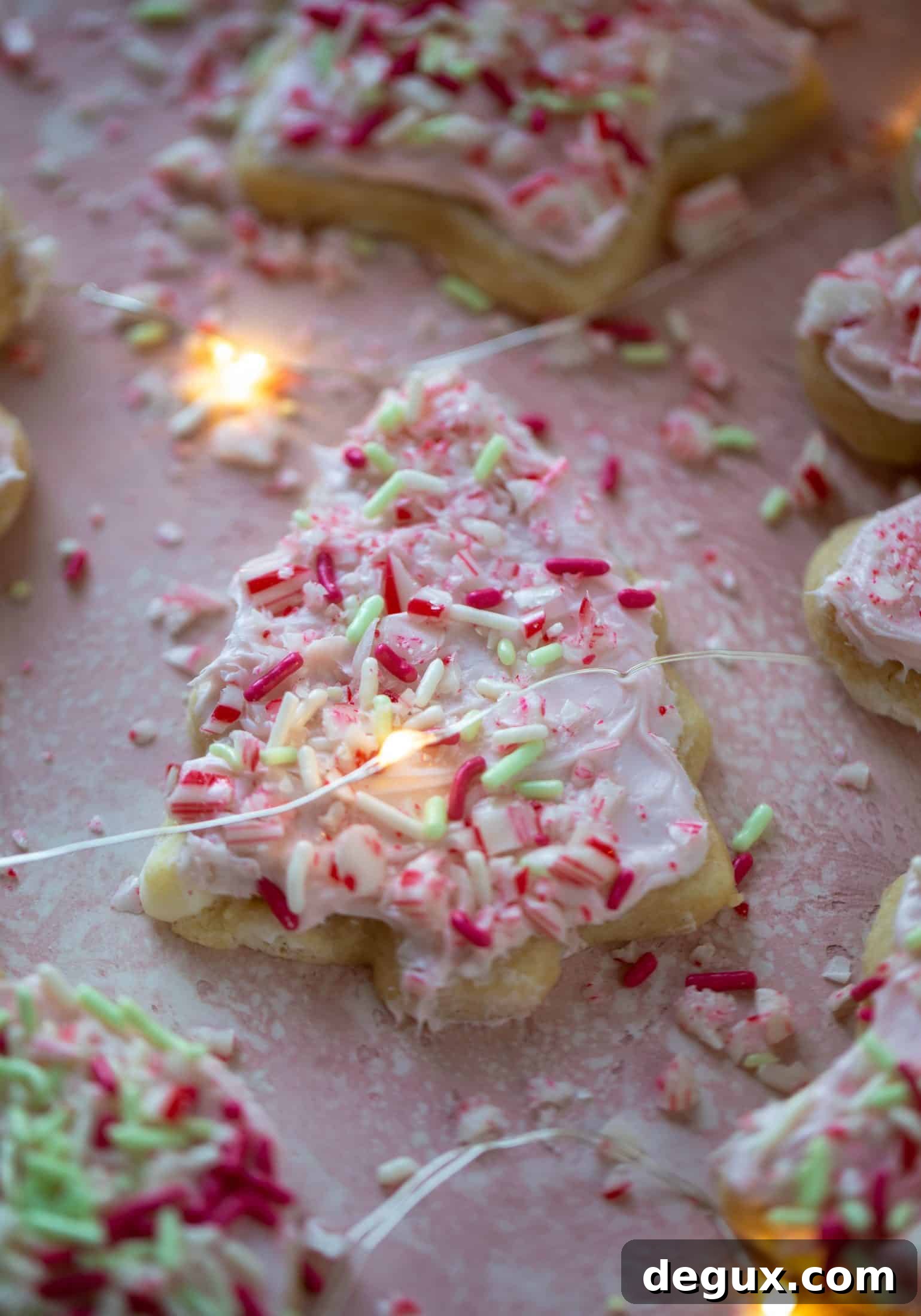 Pink Peppermint Sugar Cookie Recipe for Holiday Baking 12 Pink peppermint sugar cookies are classic vanilla cut out cookies topped with peppermint cream cheese frosting. They are delicious!