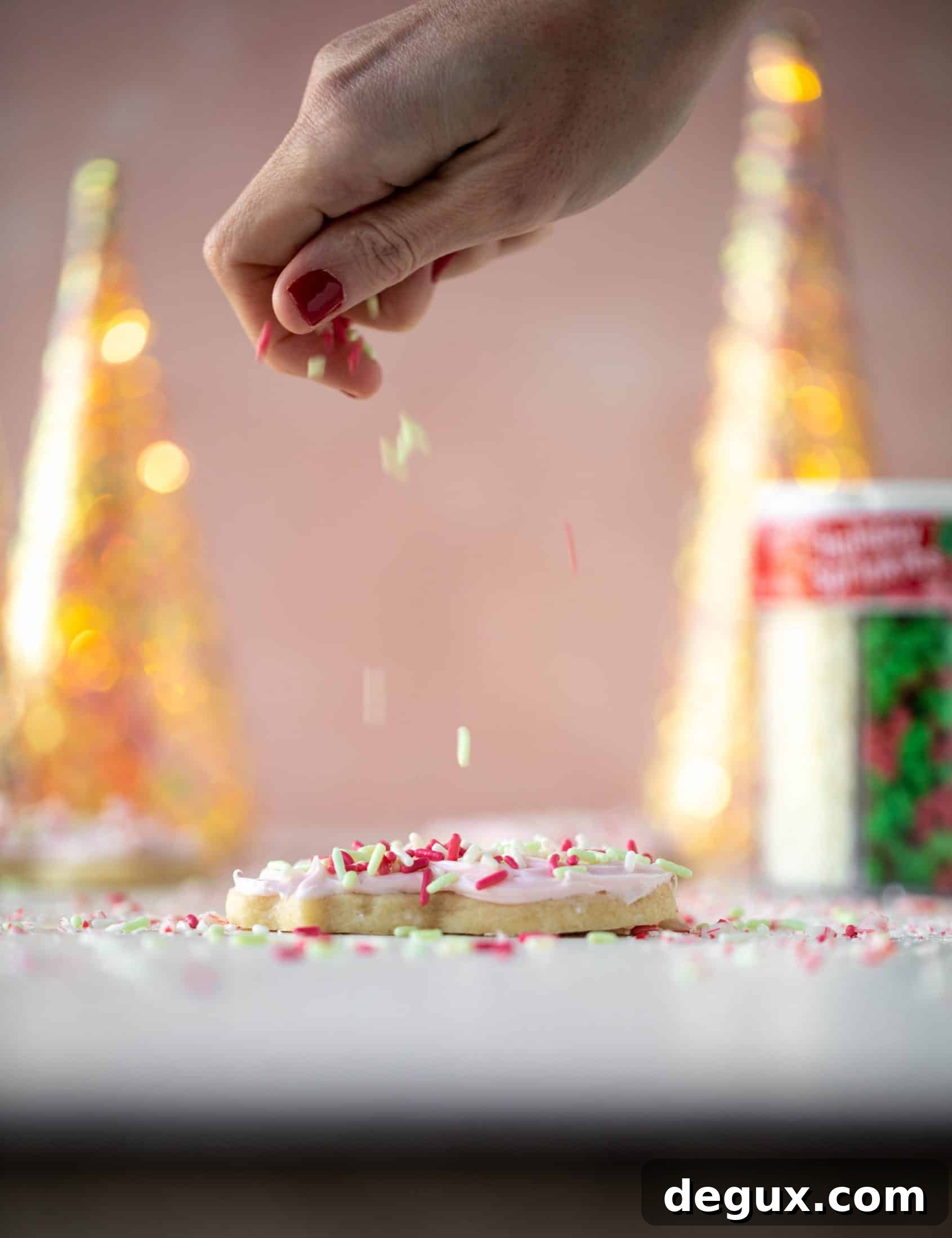 Pink Peppermint Sugar Cookie Recipe for Holiday Baking 8 Pink peppermint sugar cookies are classic vanilla cut out cookies topped with peppermint cream cheese frosting. They are delicious!