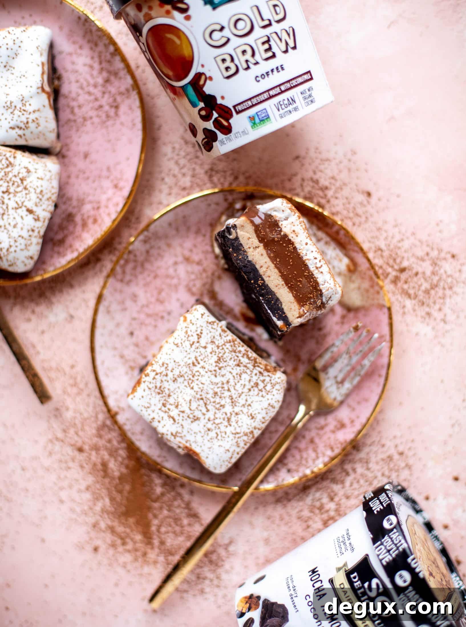 This frozen chocolate cookie dessert is a twist on the classic 90s recipe! Cookie crust, ice cream, homemade hot fudge and whipped cream. It's amazing!