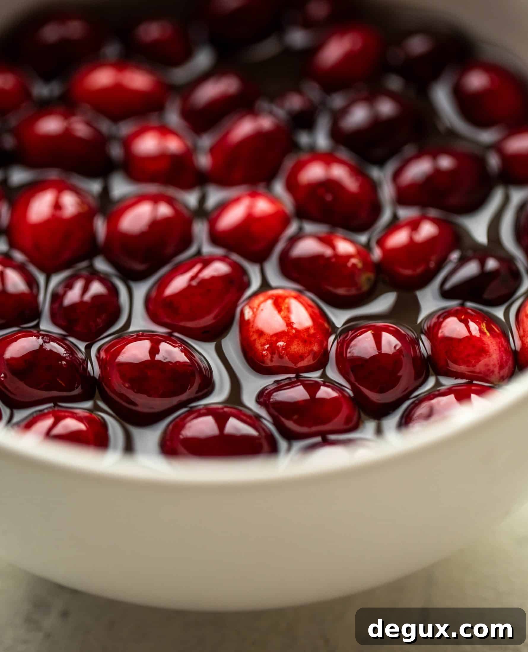the start of sugared cranberries