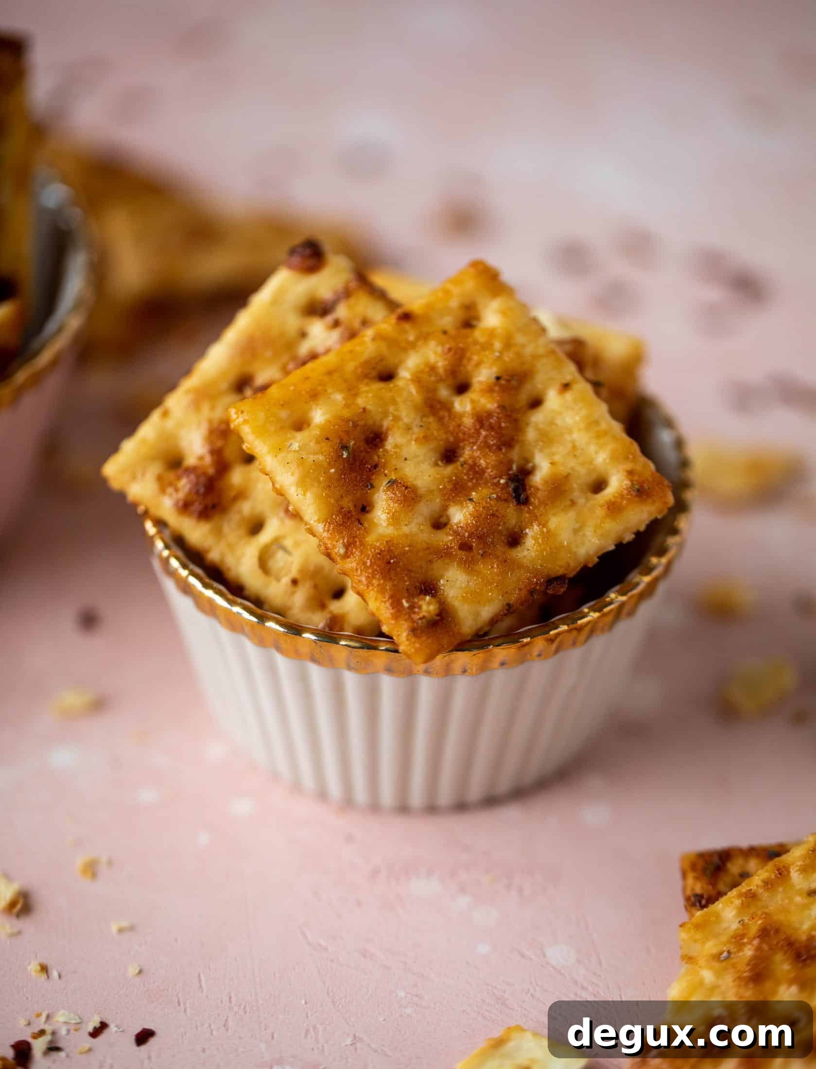 These super easy fire crackers are such a simple recipe to make! Bake the crackers with spice and butter for the perfect party snack.