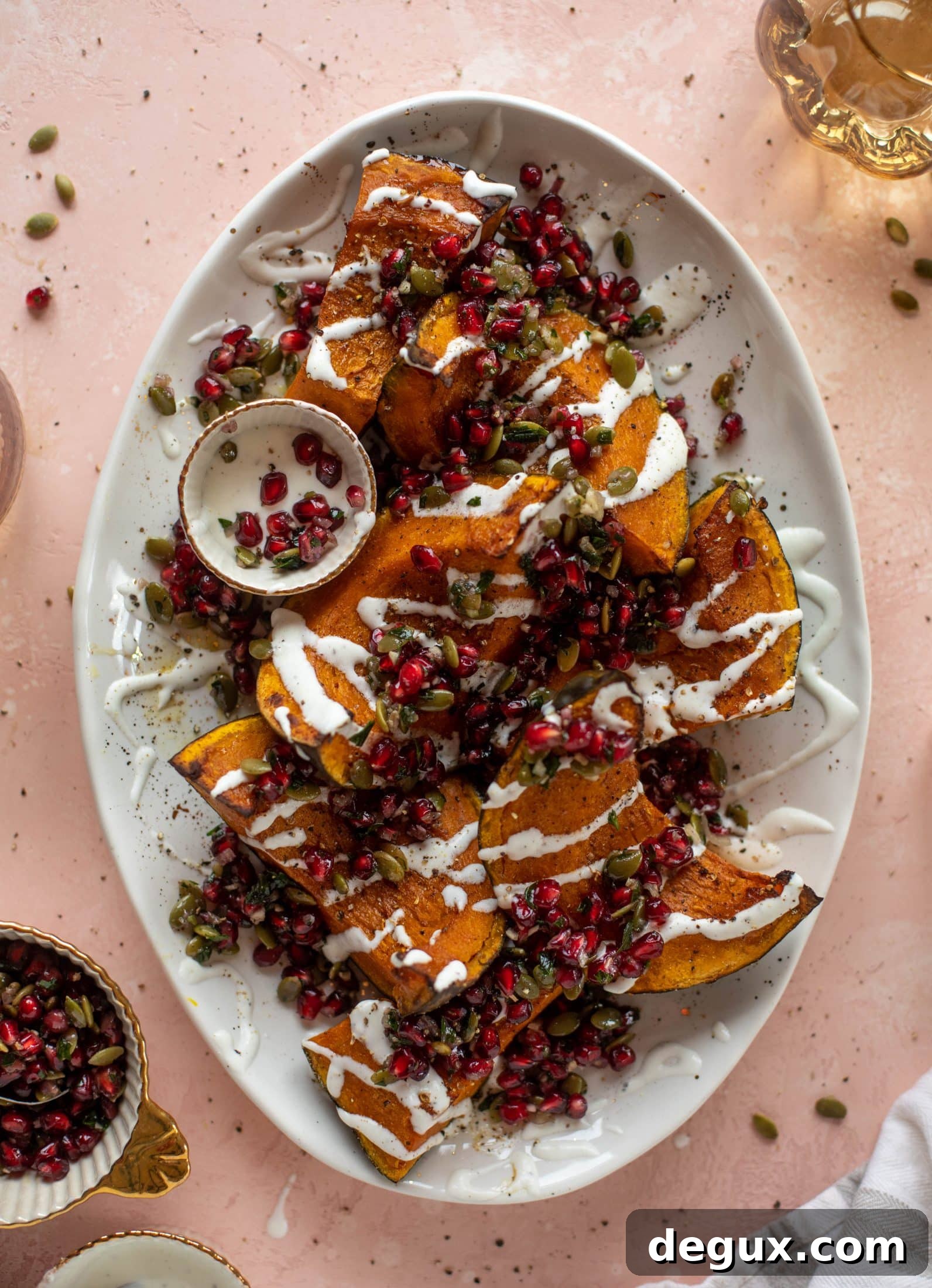 This roasted kabocha squash is caramely and naturally sweet, drizzled with whipped goat cheese and topped with pomegranate pepita relish. It's unreal!
