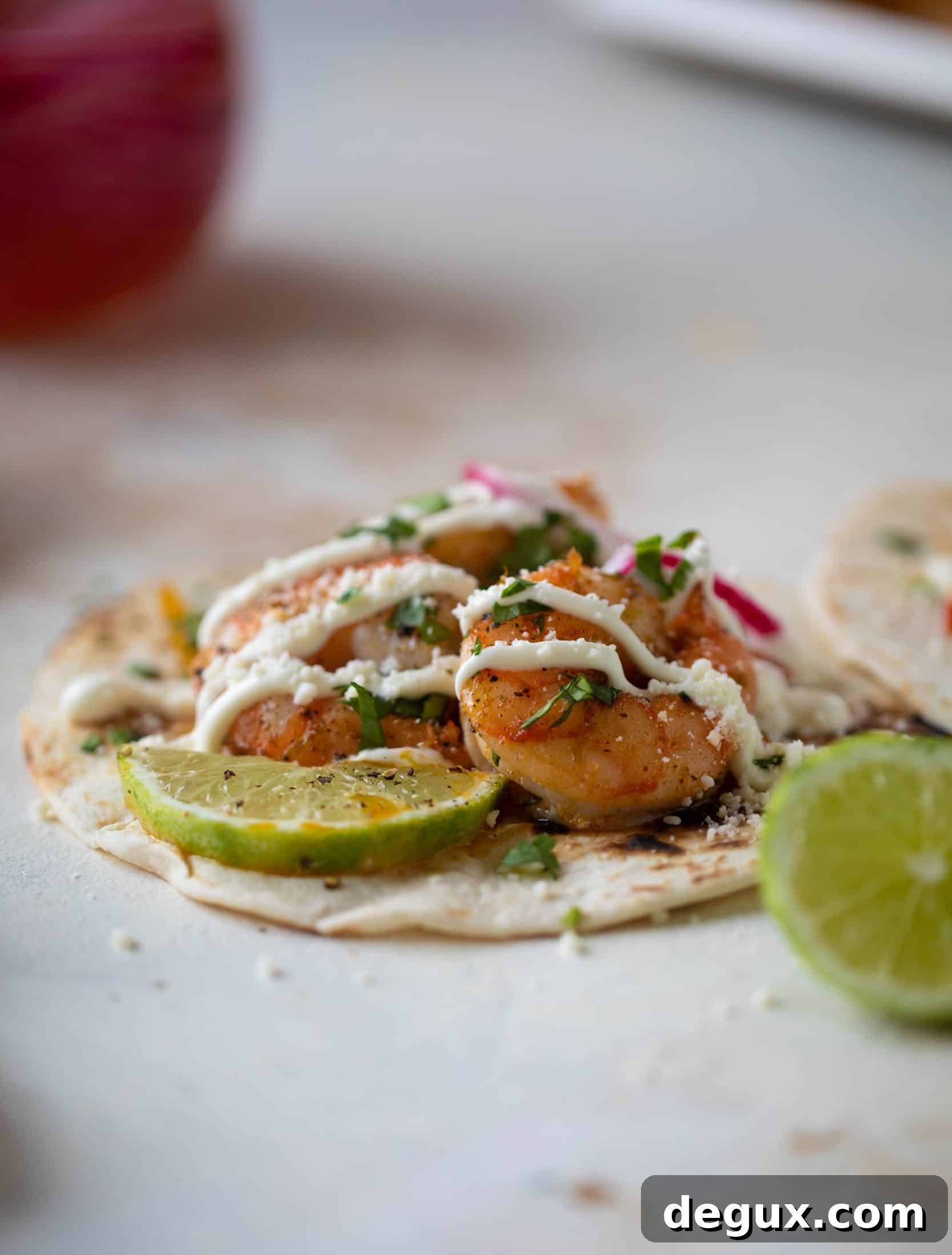 These lime sheet pan shrimp fajitas are the best weeknight meal! Make everything on the sheet pan and serve in warm tortillas. Delicious!