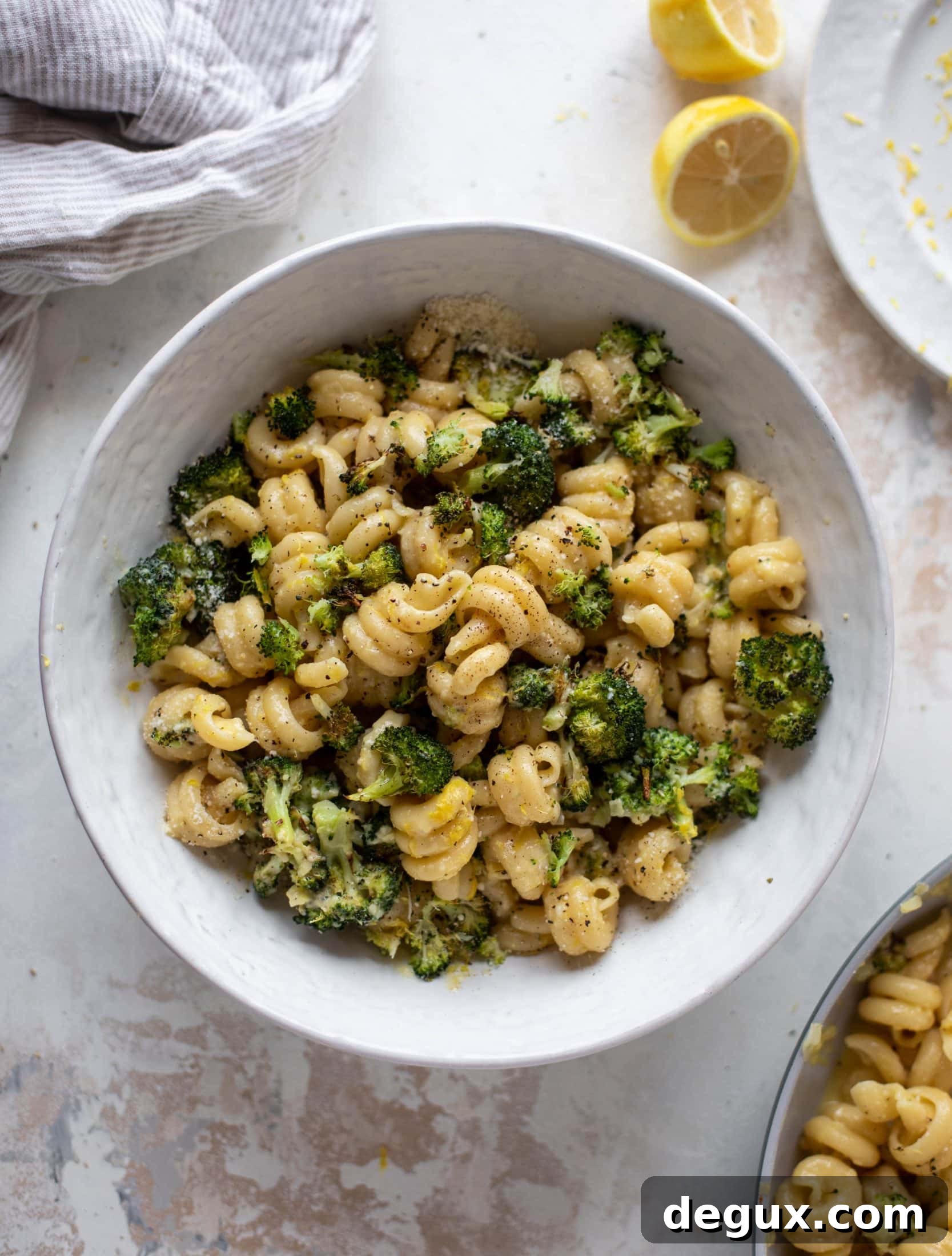 Broccoli lemon carbonara pasta is the freshest take on carbonara! Roasted broccoli, garlic and a parmesan lemon sauce. It's ridiculously good!