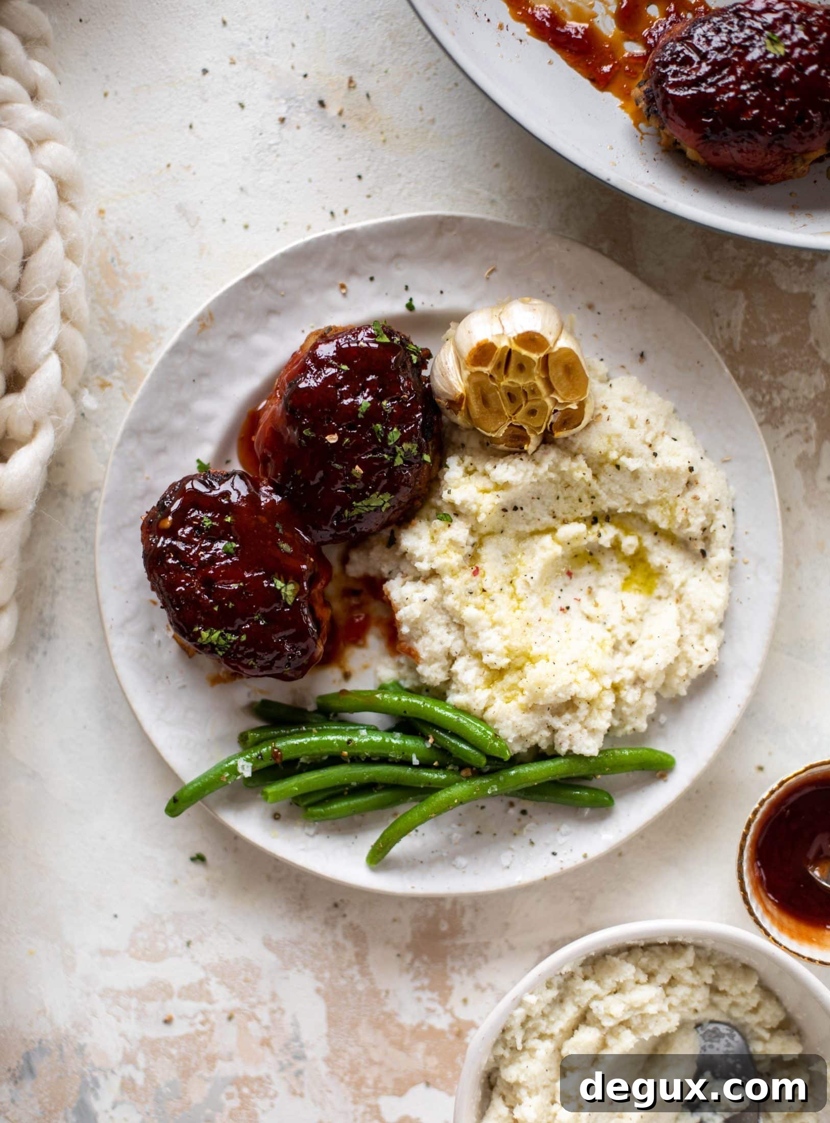 Mini Turkey Meatloaves with Roasted Garlic Cauliflower Mash Recipe 11 Mini turkey meatloaf in a skillet is the best weeknight dinner idea! Serve with roasted garlic cauliflower mash and your favorite green veggie on the side.