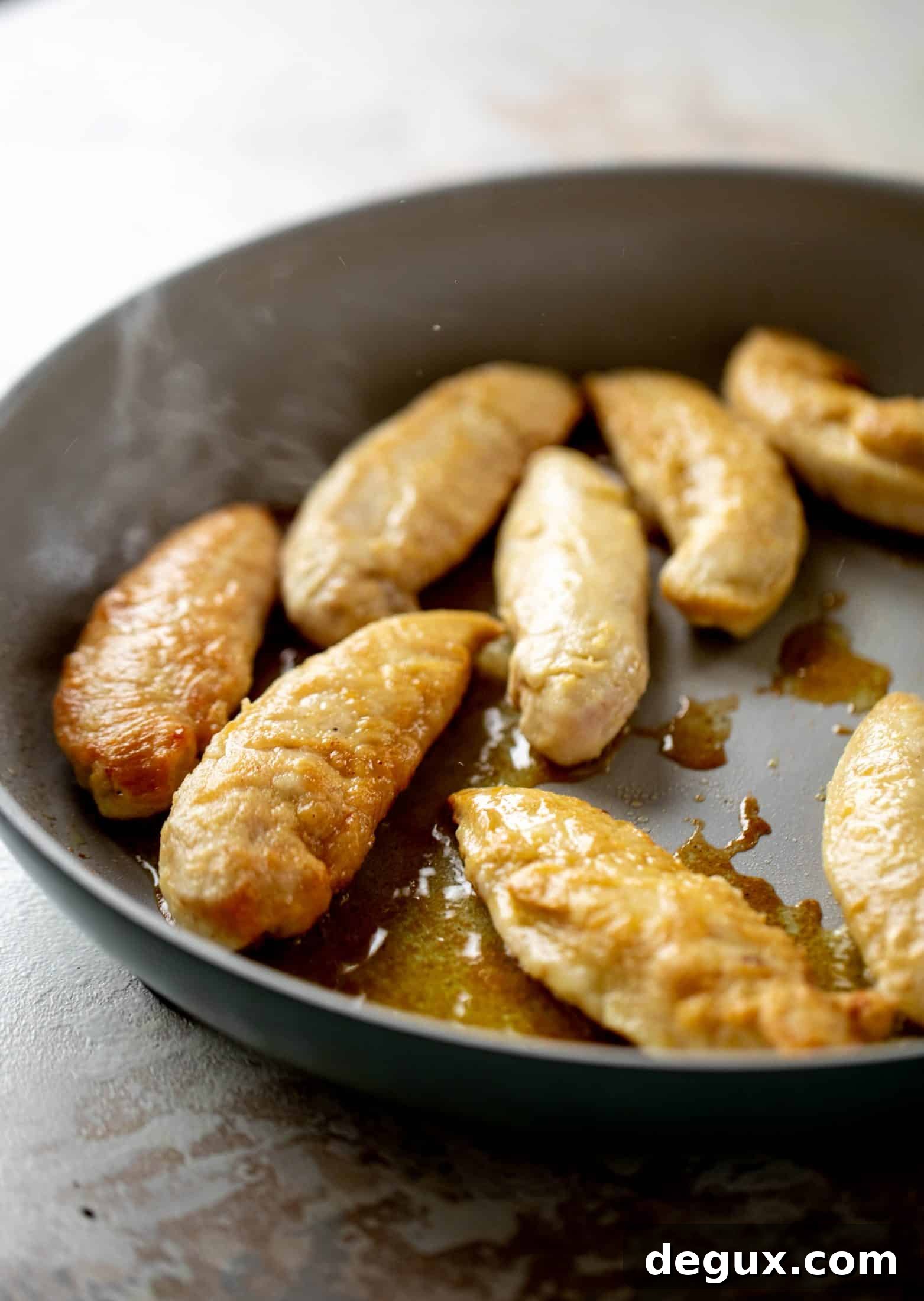 My mom's chicken marsala is easy and ridiculously flavorful! It's made without mushrooms and served alongside almond brown butter green beans.