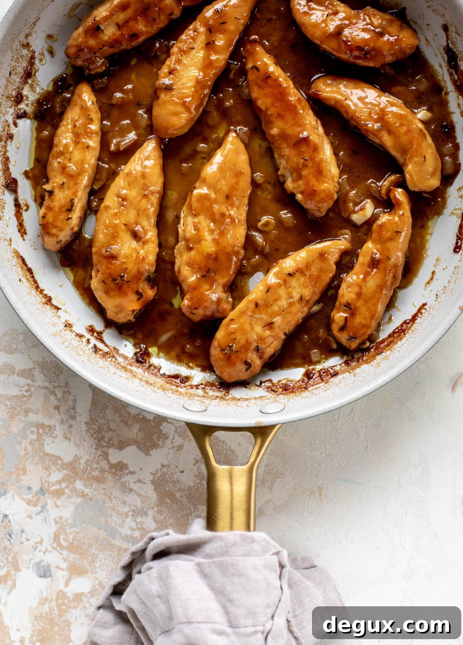 My mom's chicken marsala is easy and ridiculously flavorful! It's made without mushrooms and served alongside almond brown butter green beans.