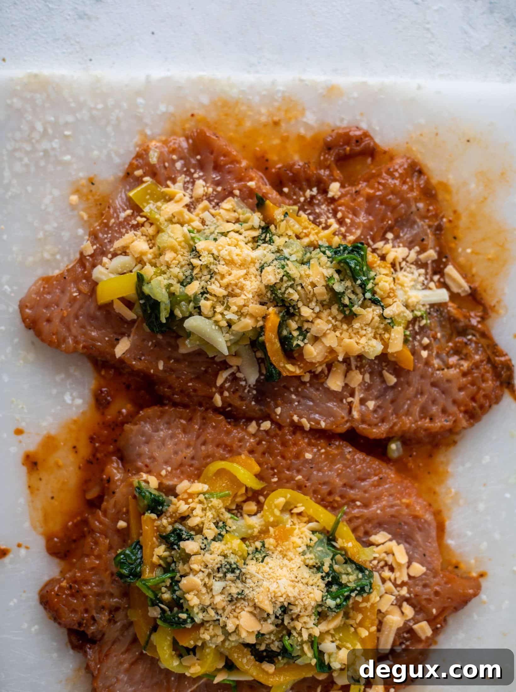 These southwest stuffed turkey tenderloins are so flavorful and filled with spinach, peppers, onions and cheddar! Serve alongside a lime black bean salad.