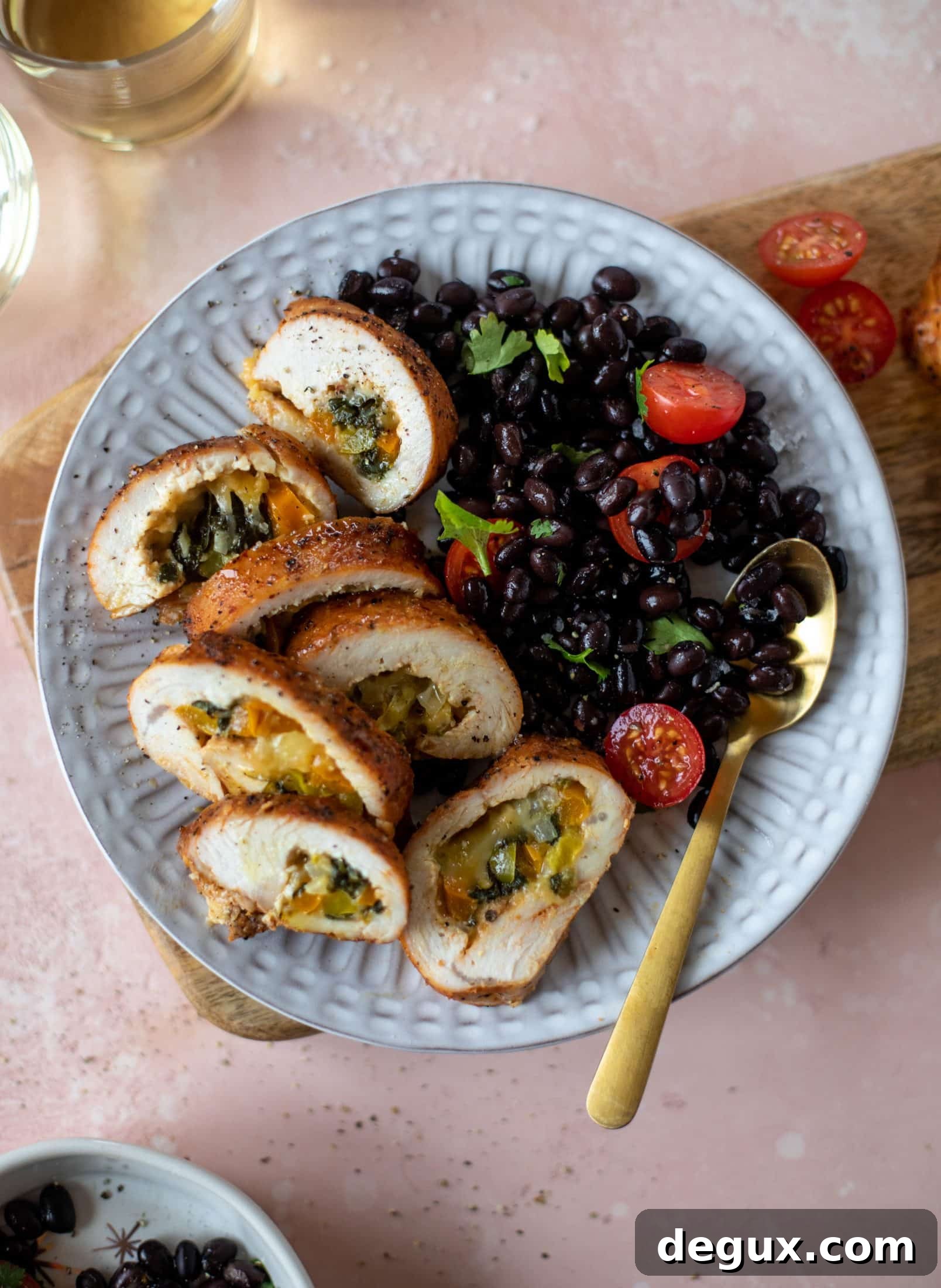 These southwest stuffed turkey tenderloins are so flavorful and filled with spinach, peppers, onions and cheddar! Serve alongside a lime black bean salad.