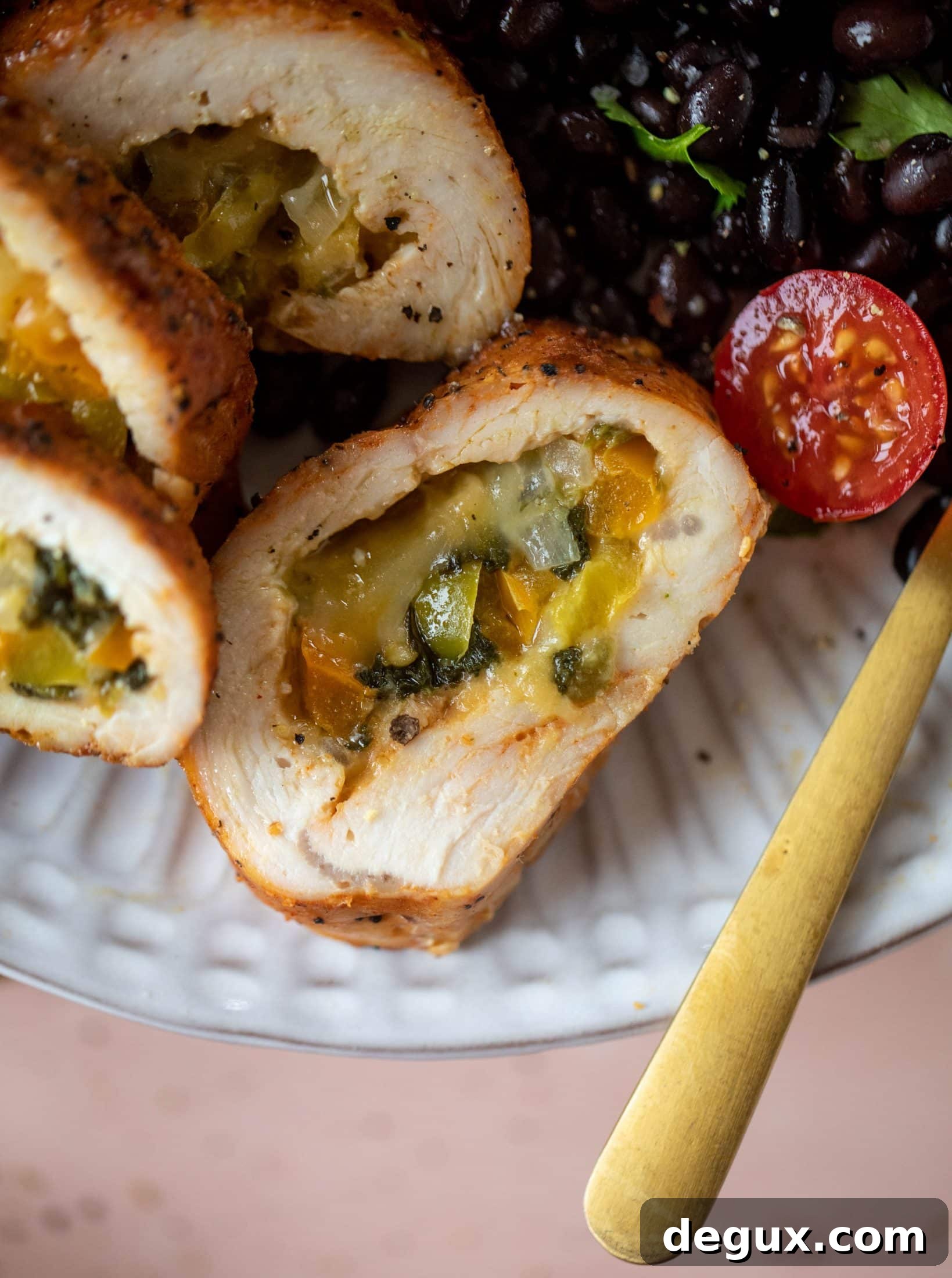 These southwest stuffed turkey tenderloins are so flavorful and filled with spinach, peppers, onions and cheddar! Serve alongside a lime black bean salad.