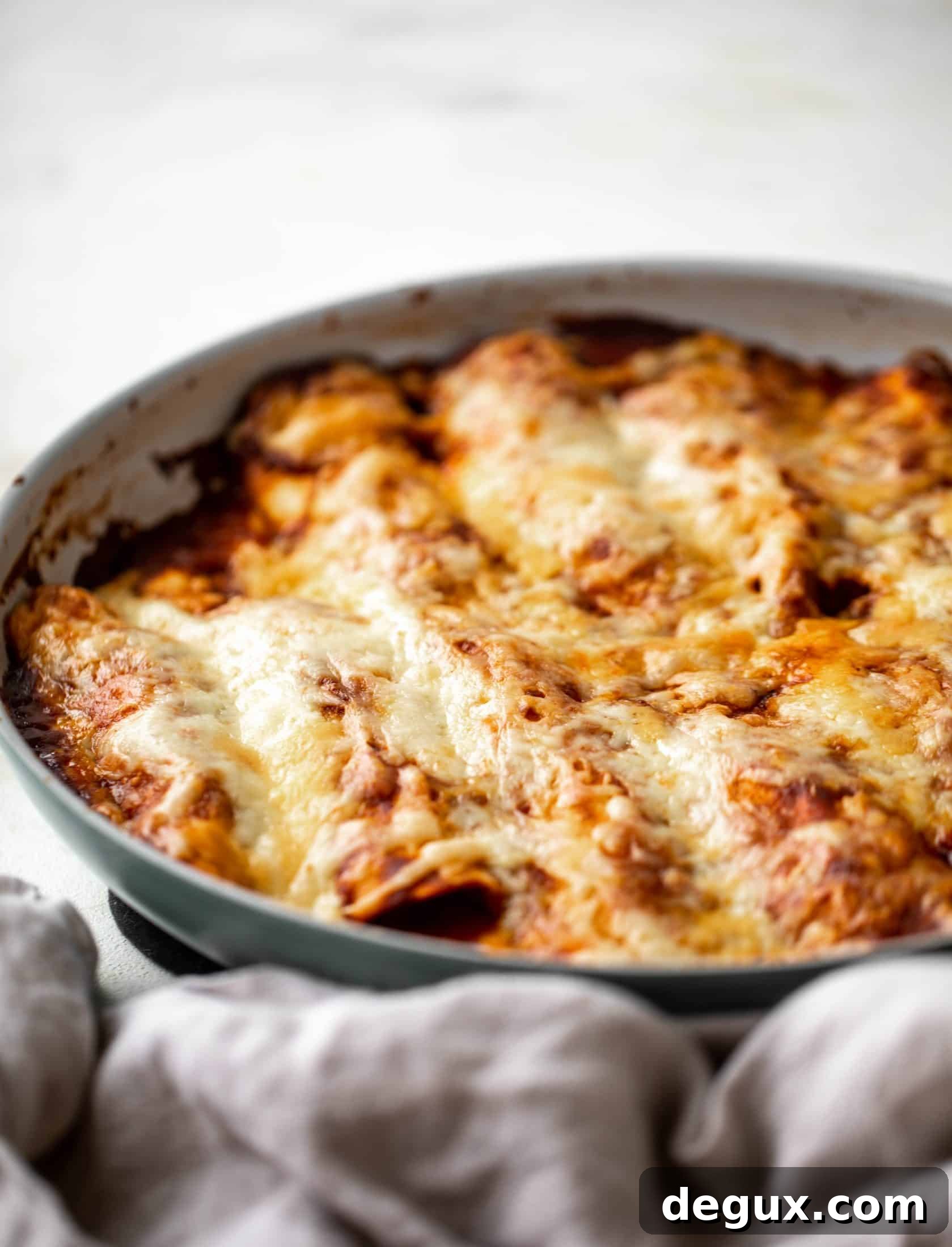 Chipotle chicken skillet enchiladas are loaded with flavor and come together so quickly! They are the perfect spicy weeknight meal.